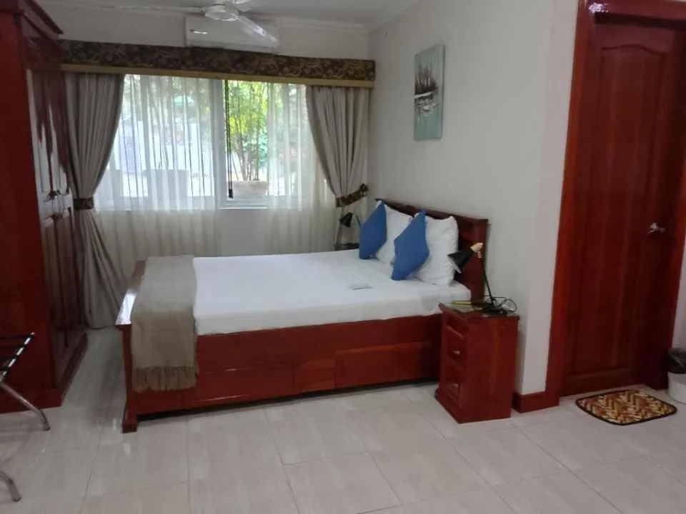 Bed in Ocean Breeze Resort