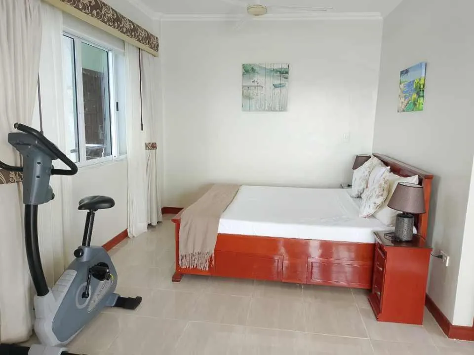 Bed in Ocean Breeze Resort