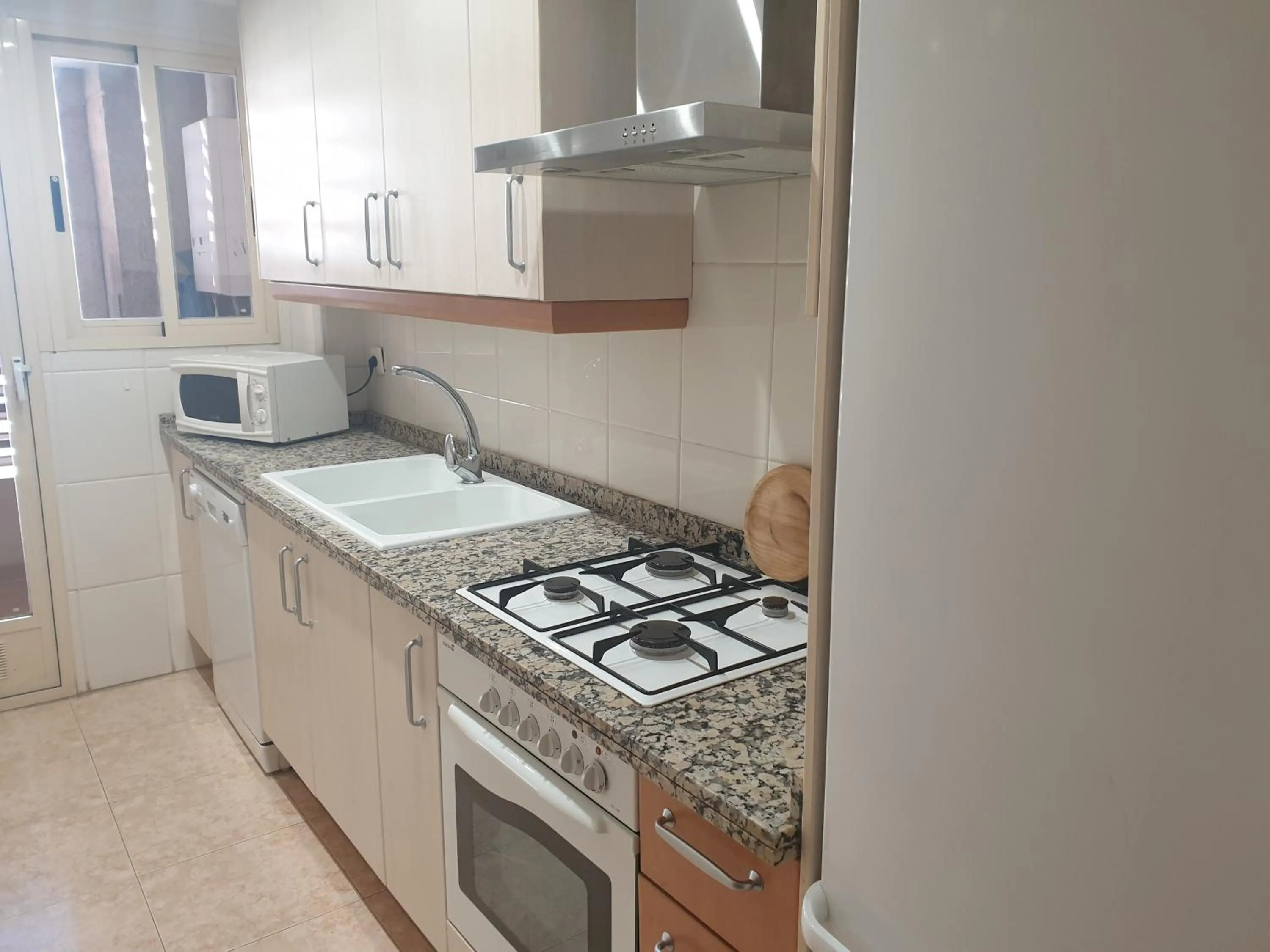 Kitchen or kitchenette in Oceanográfico Apartments