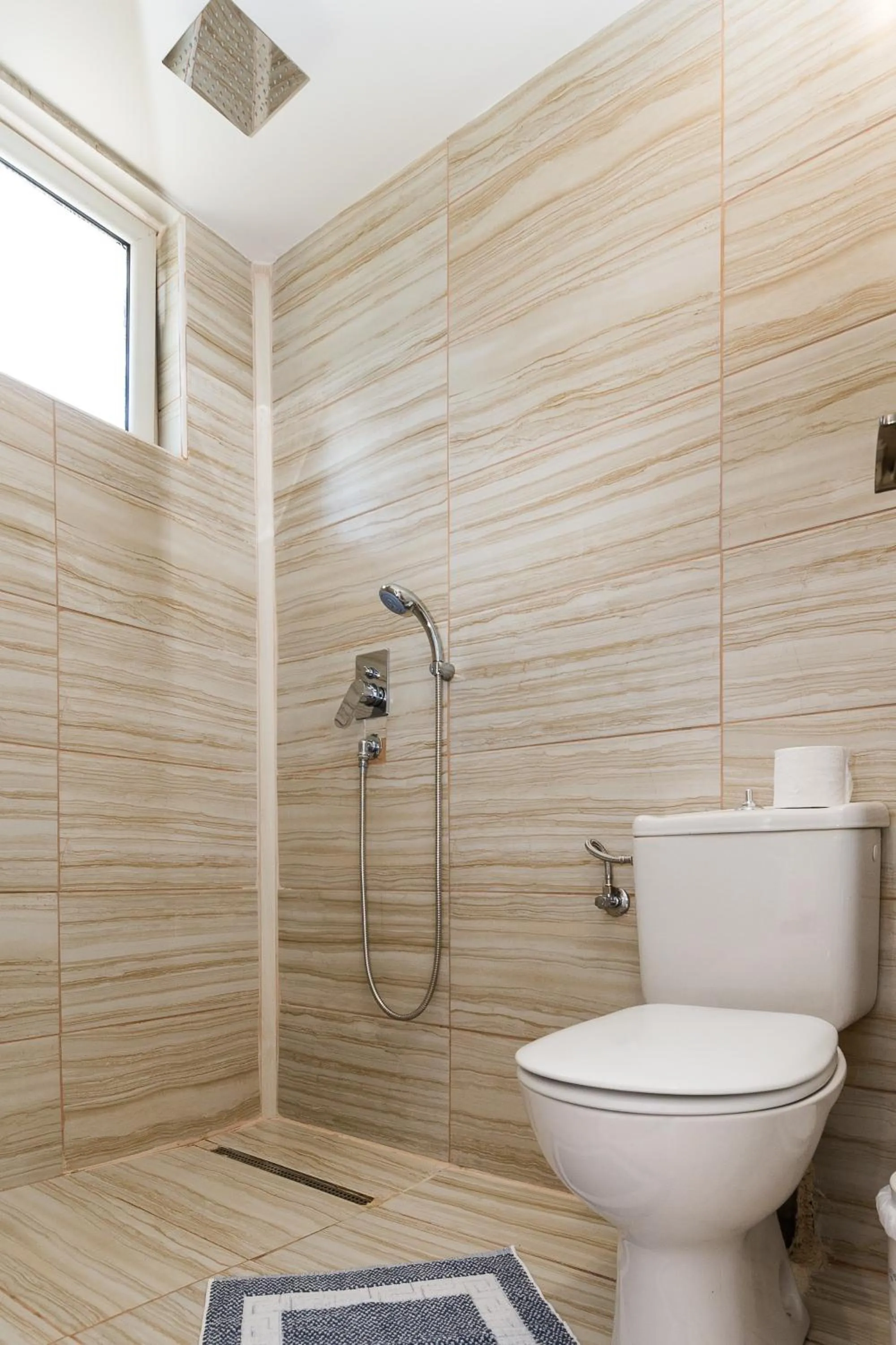 Bathroom in Rooms 48 by Zante Plaza