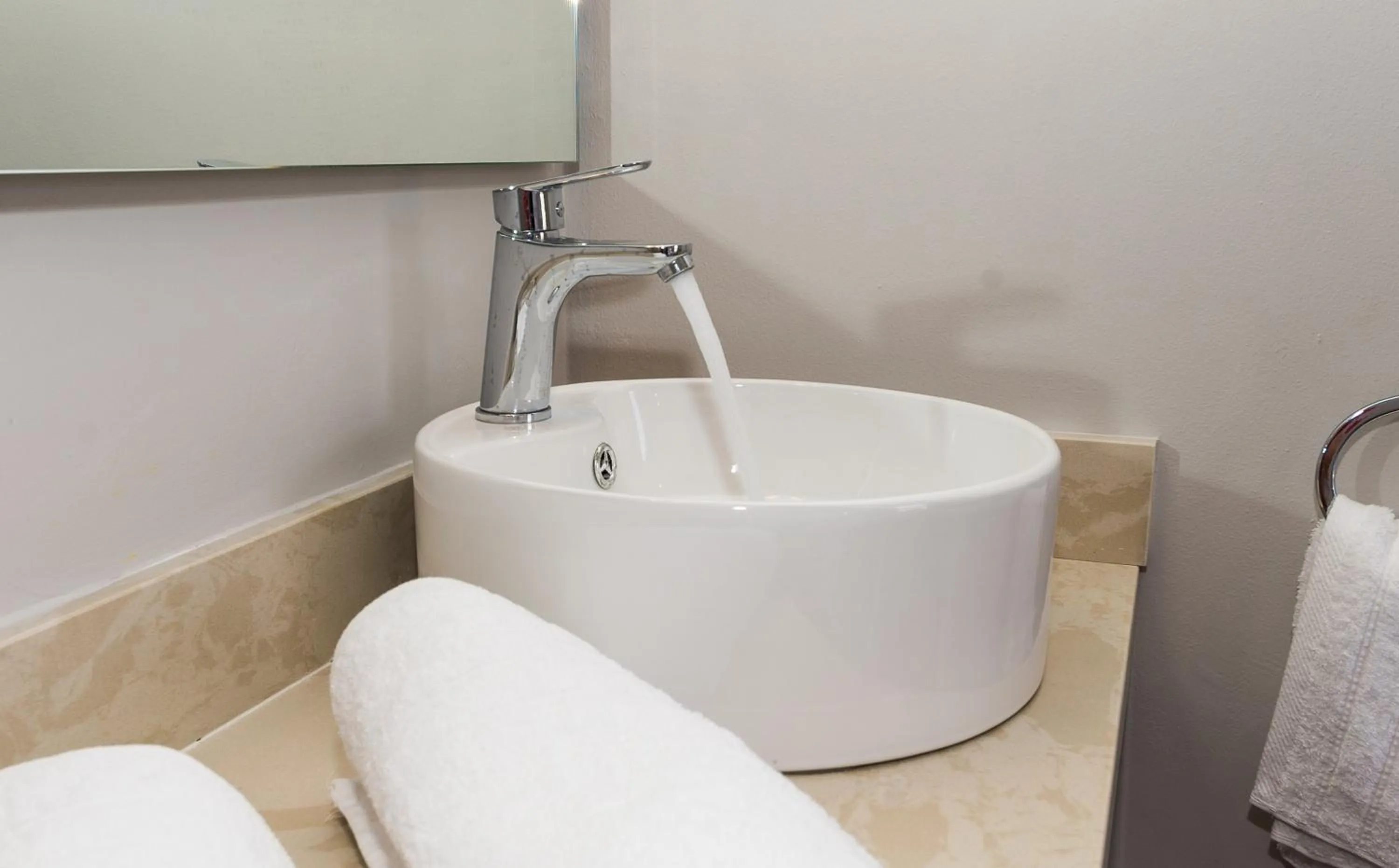 Bathroom in Rooms 48 by Zante Plaza