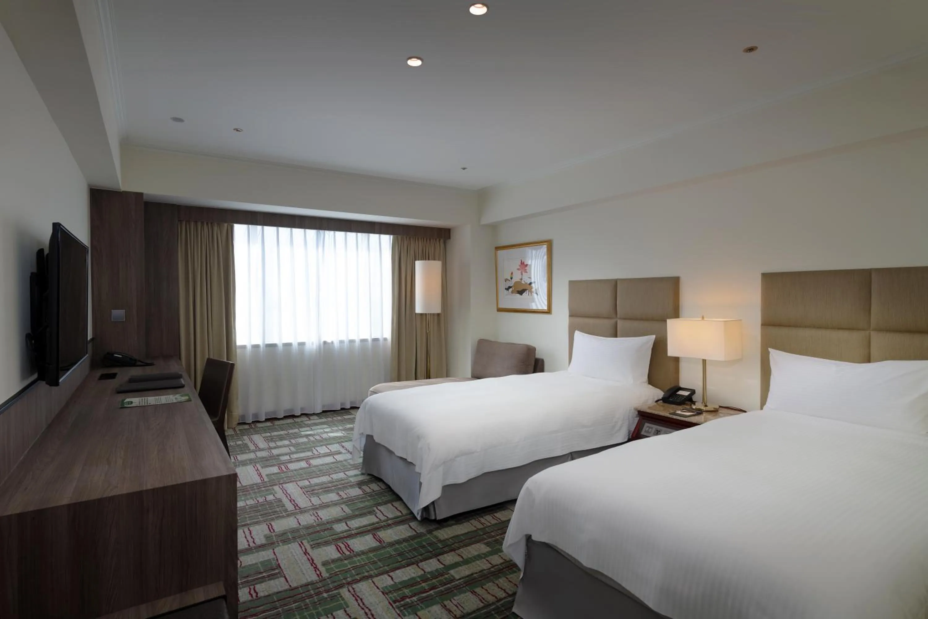 Bed in The Howard Plaza Hotel Kaohsiung