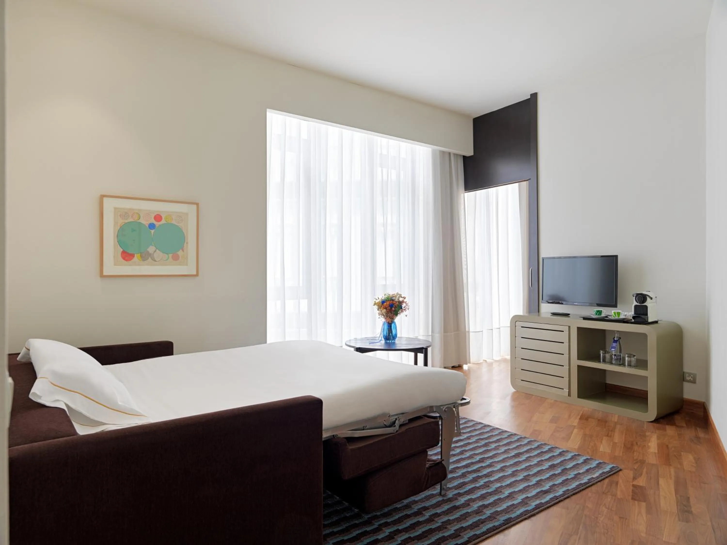 Living room, Bed in H10 Casanova