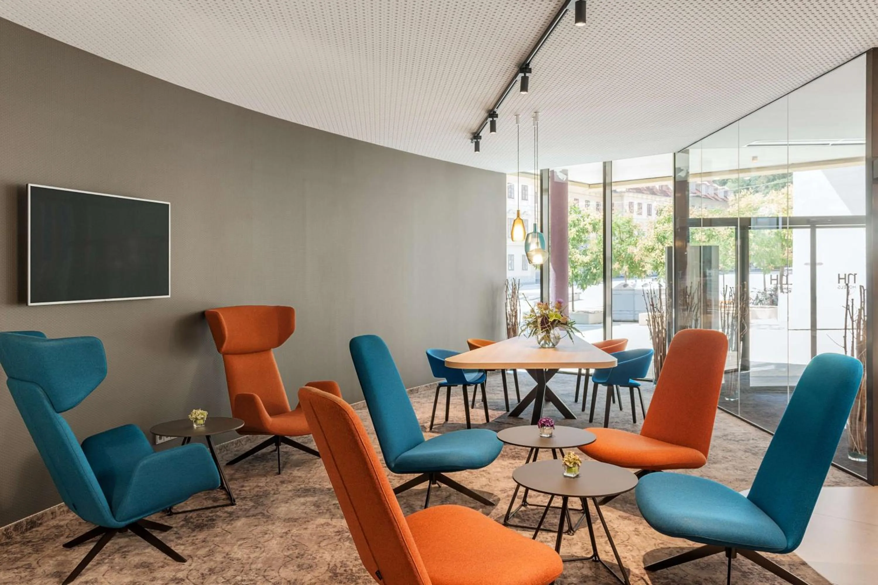 Lobby or reception in NH Graz City