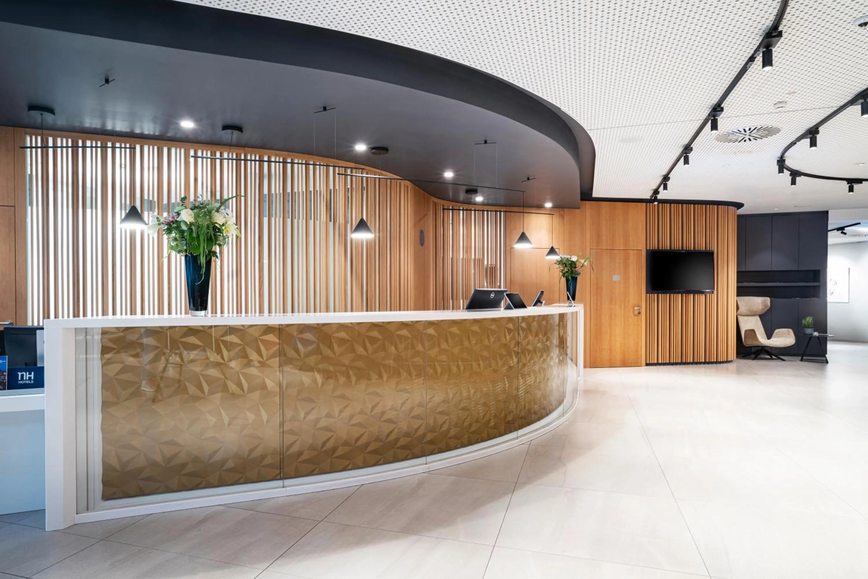 Lobby or reception in NH Graz City