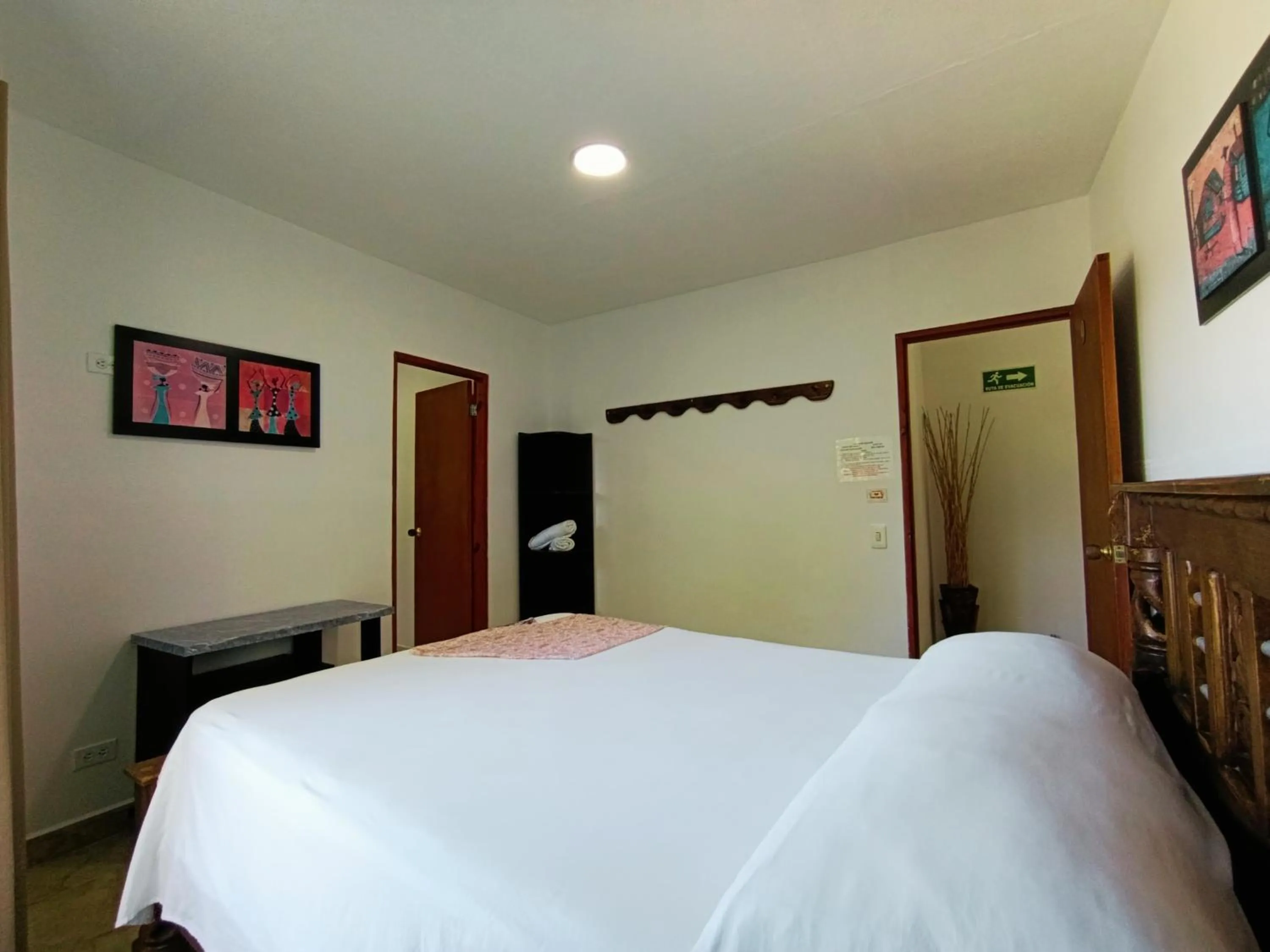 Photo of the whole room, Bed in The Rock House Eco