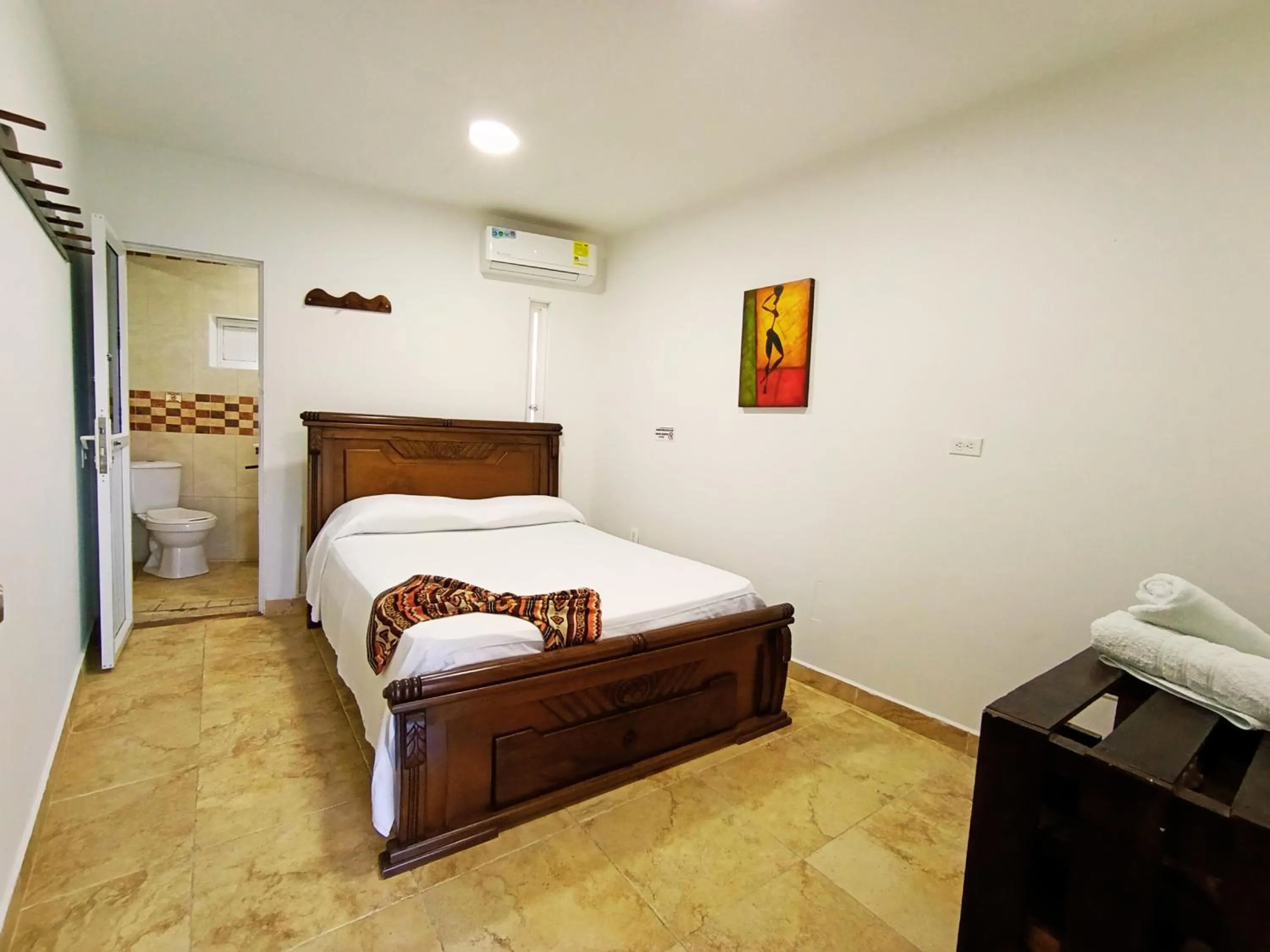 Photo of the whole room, Bed in The Rock House Eco