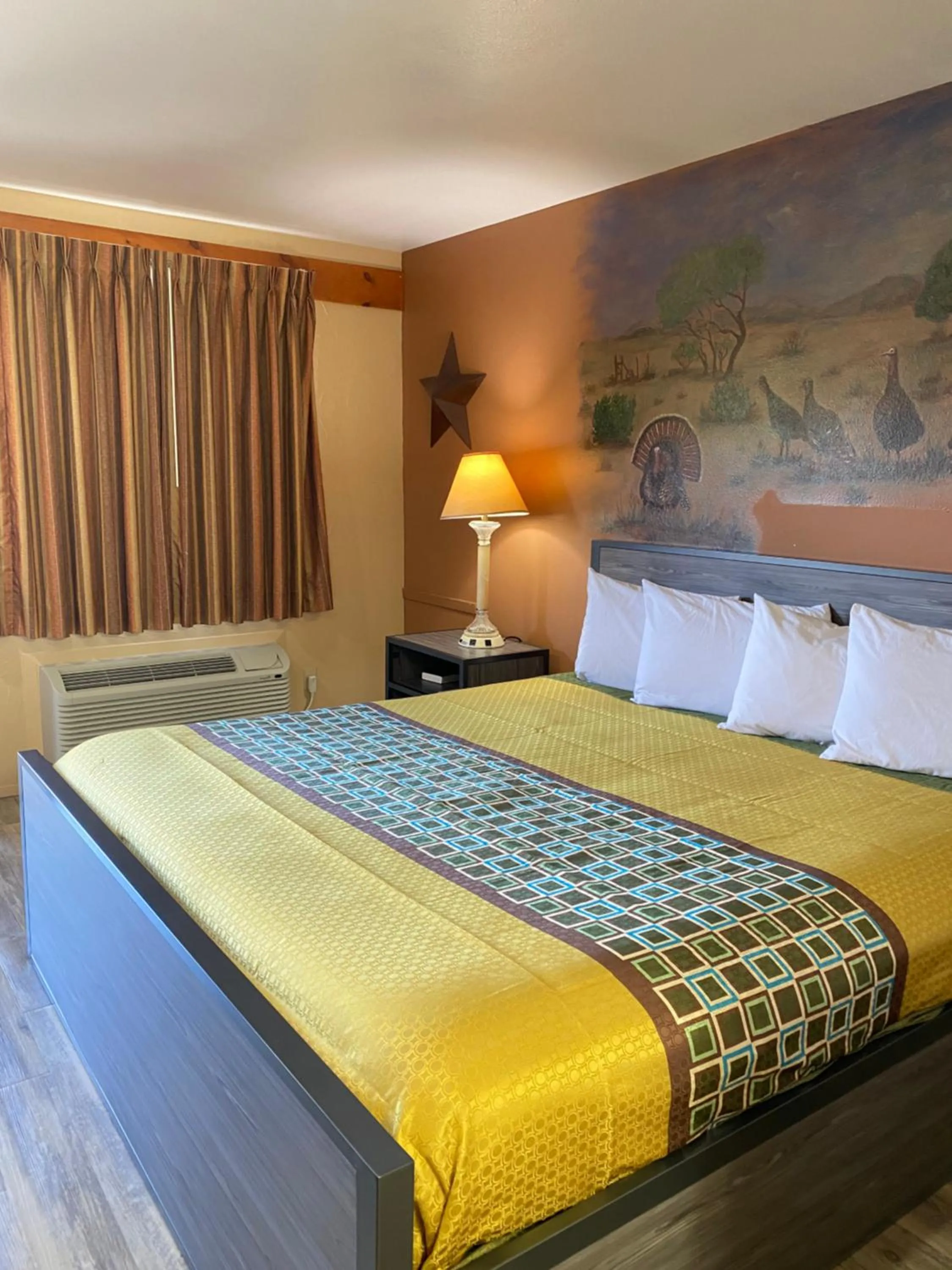 Bed in Americas Best Value Inn - Legend's Inn