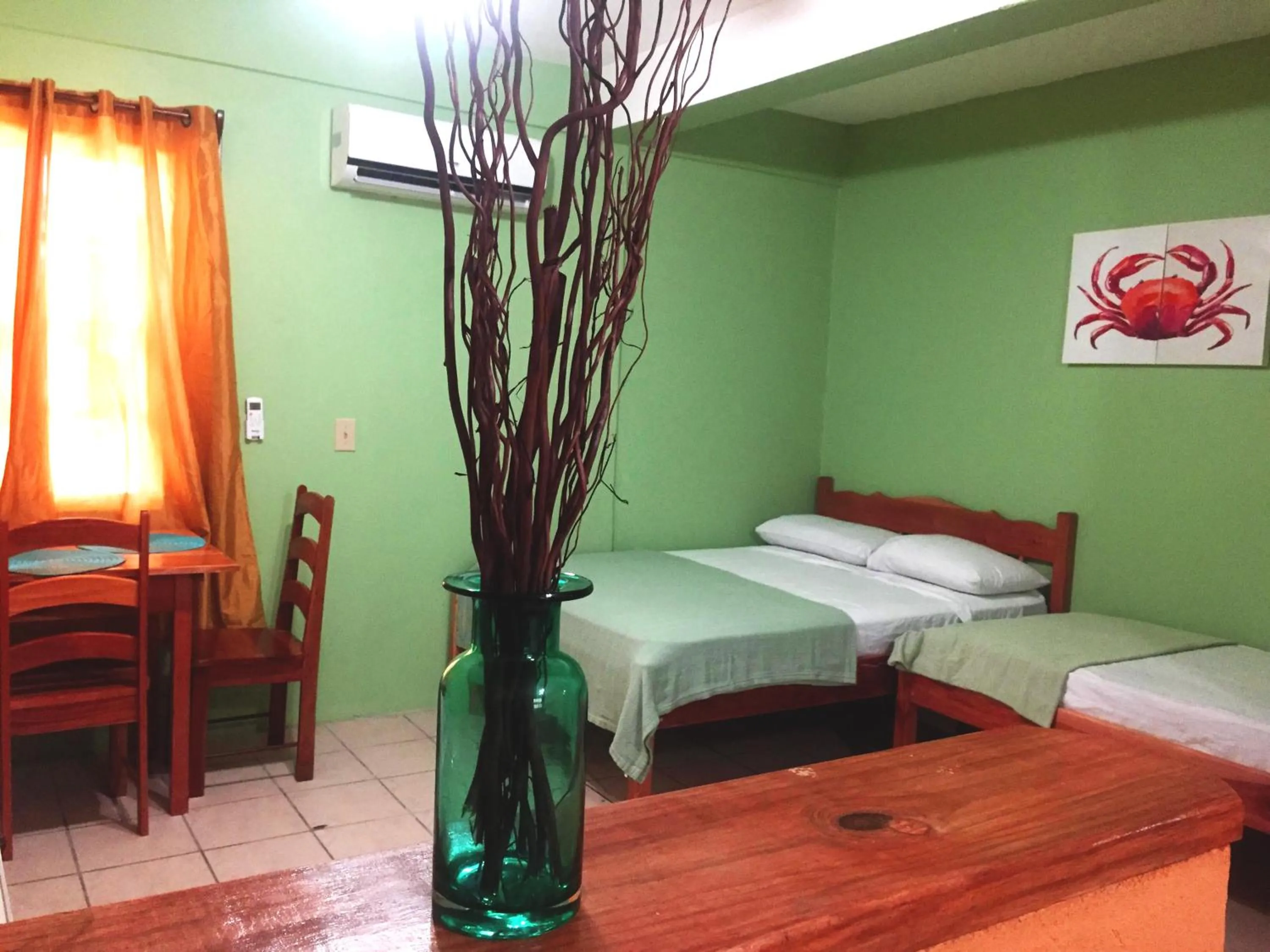 Bed in Ambergris Sunset Hotel