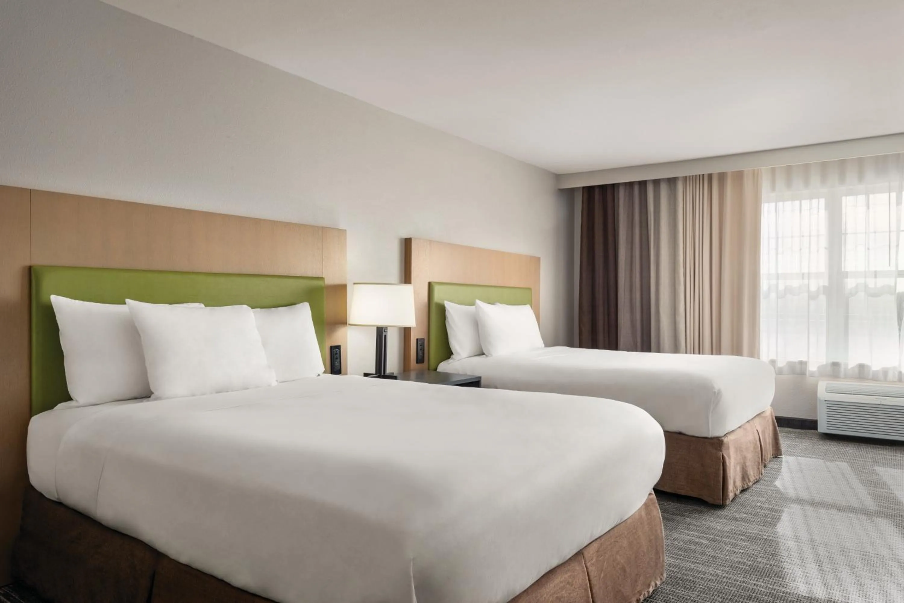 Bed in Country Inn & Suites by Radisson, Dubuque, IA