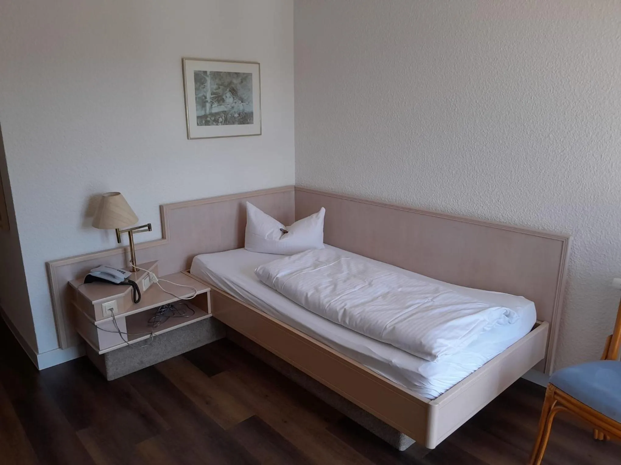 Photo of the whole room, Bed in Hotel Aichtaler Hof