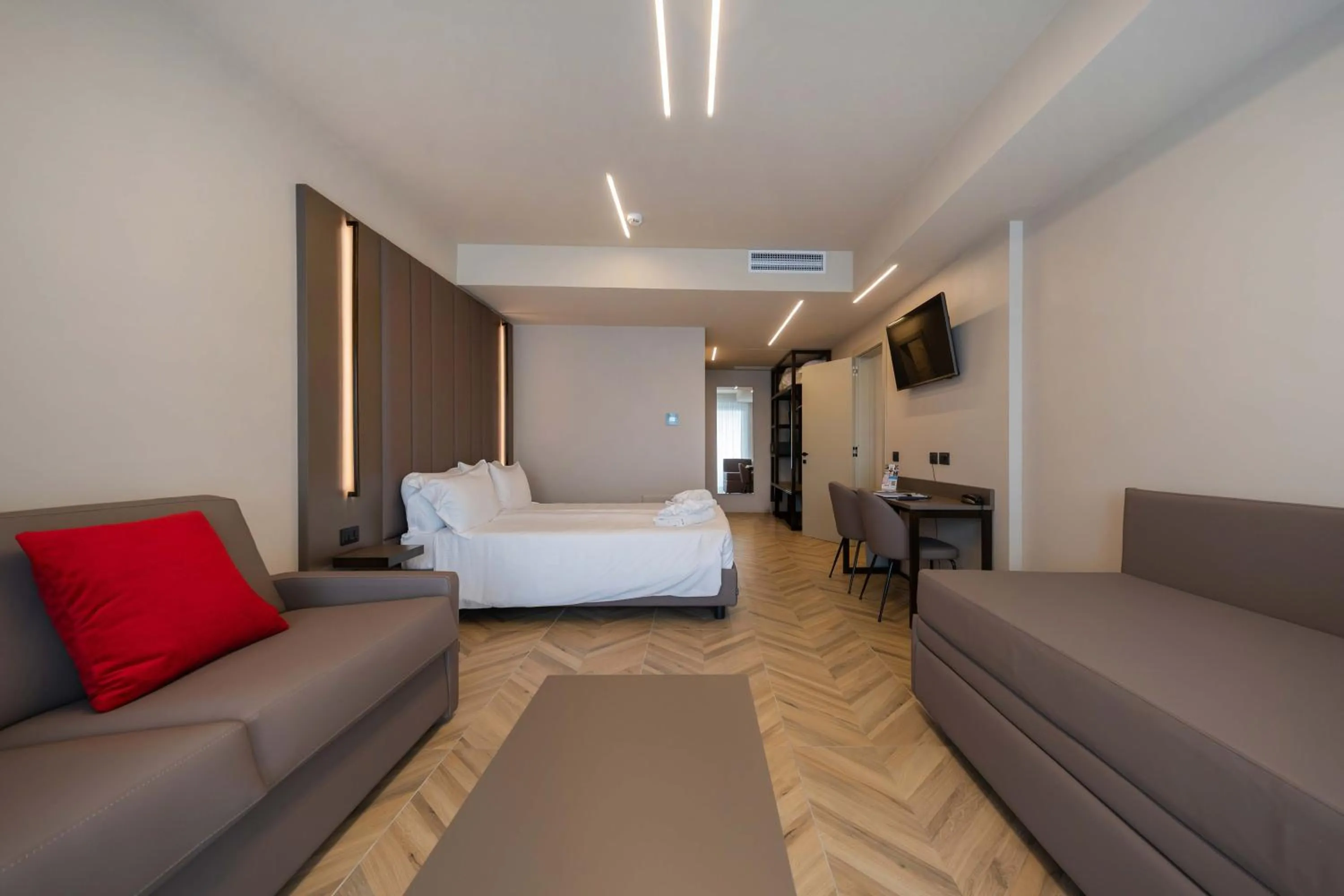 Bed in Aurora ApartHotel