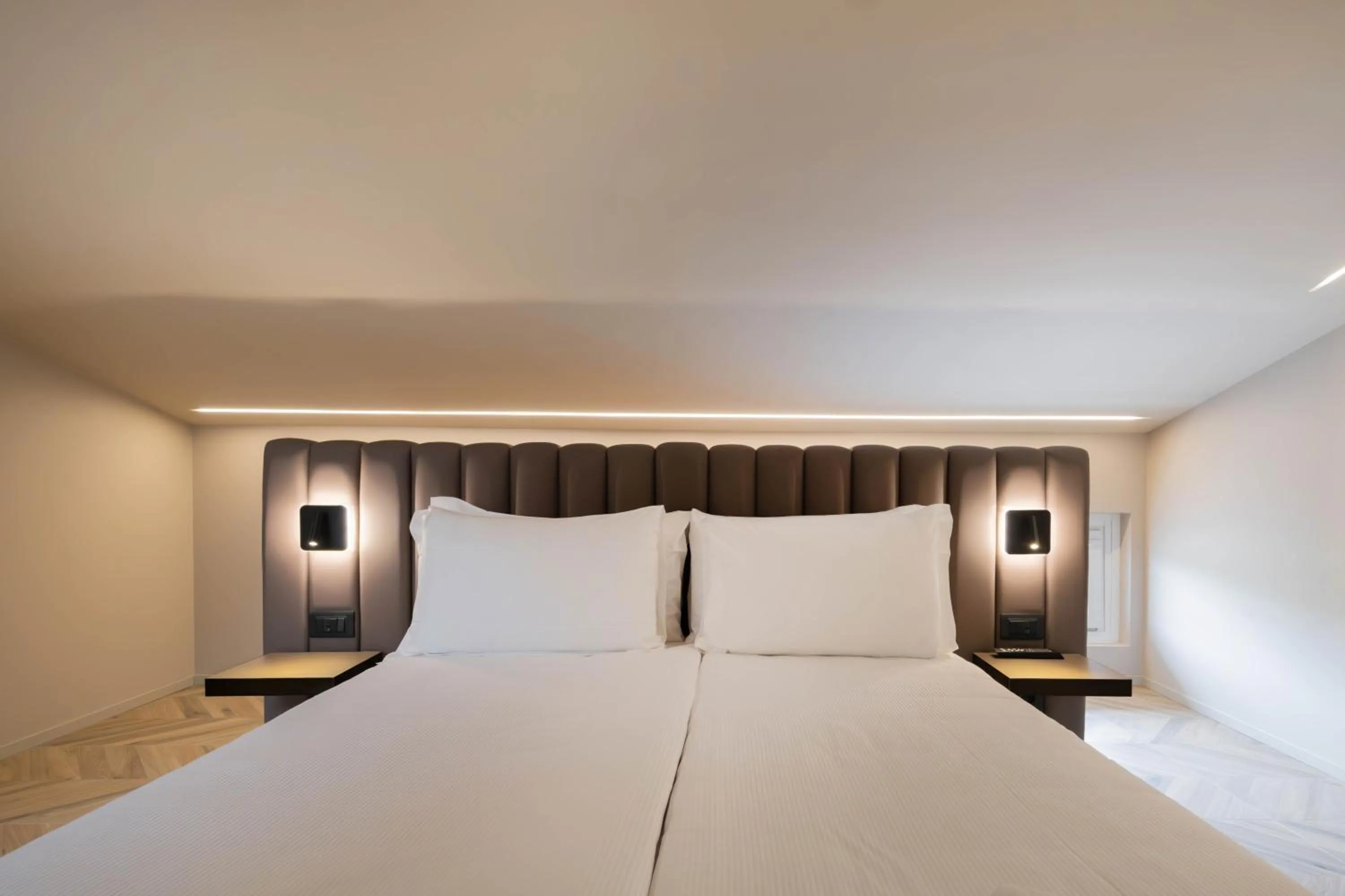 Bed in Aurora ApartHotel