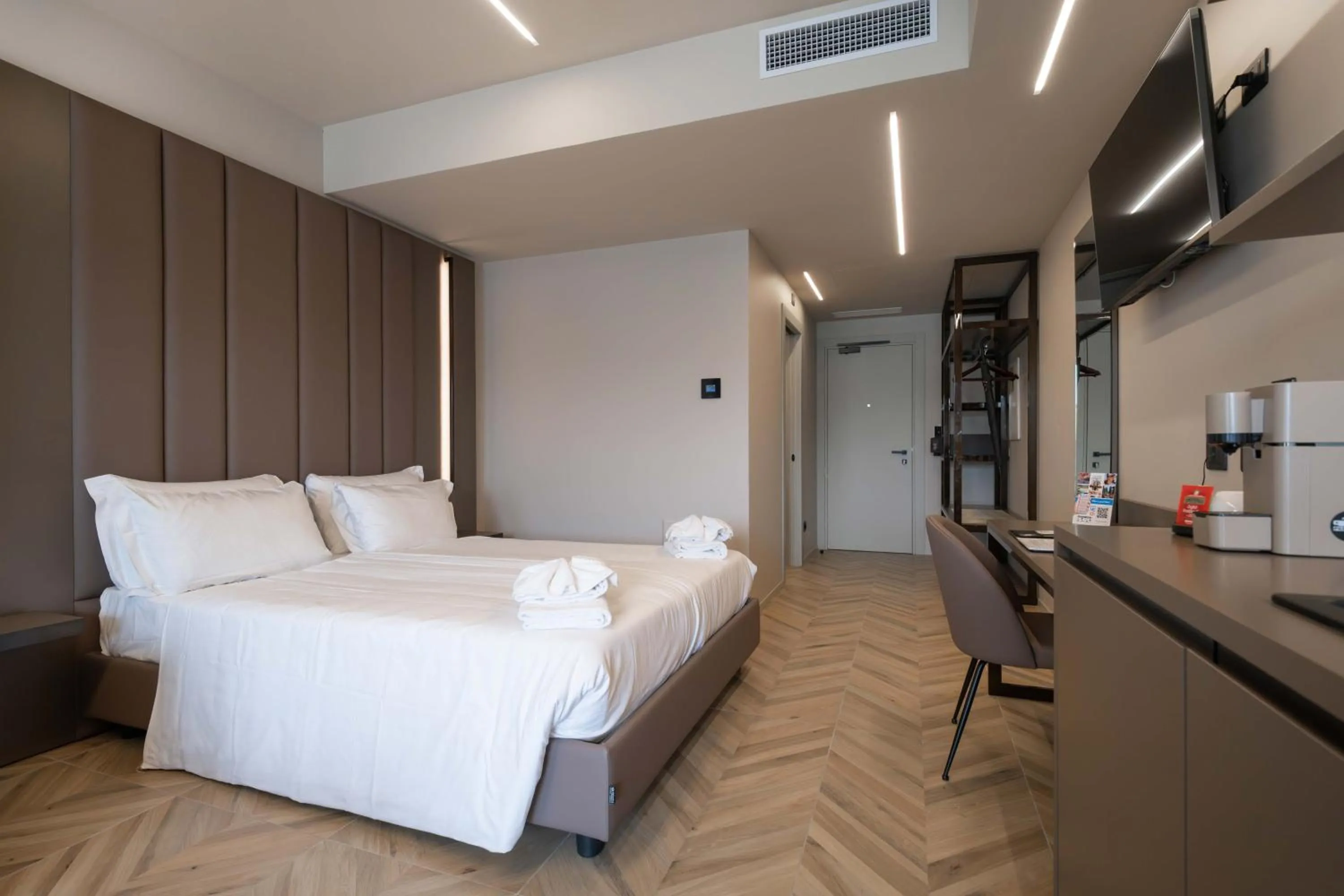 Bed in Aurora ApartHotel