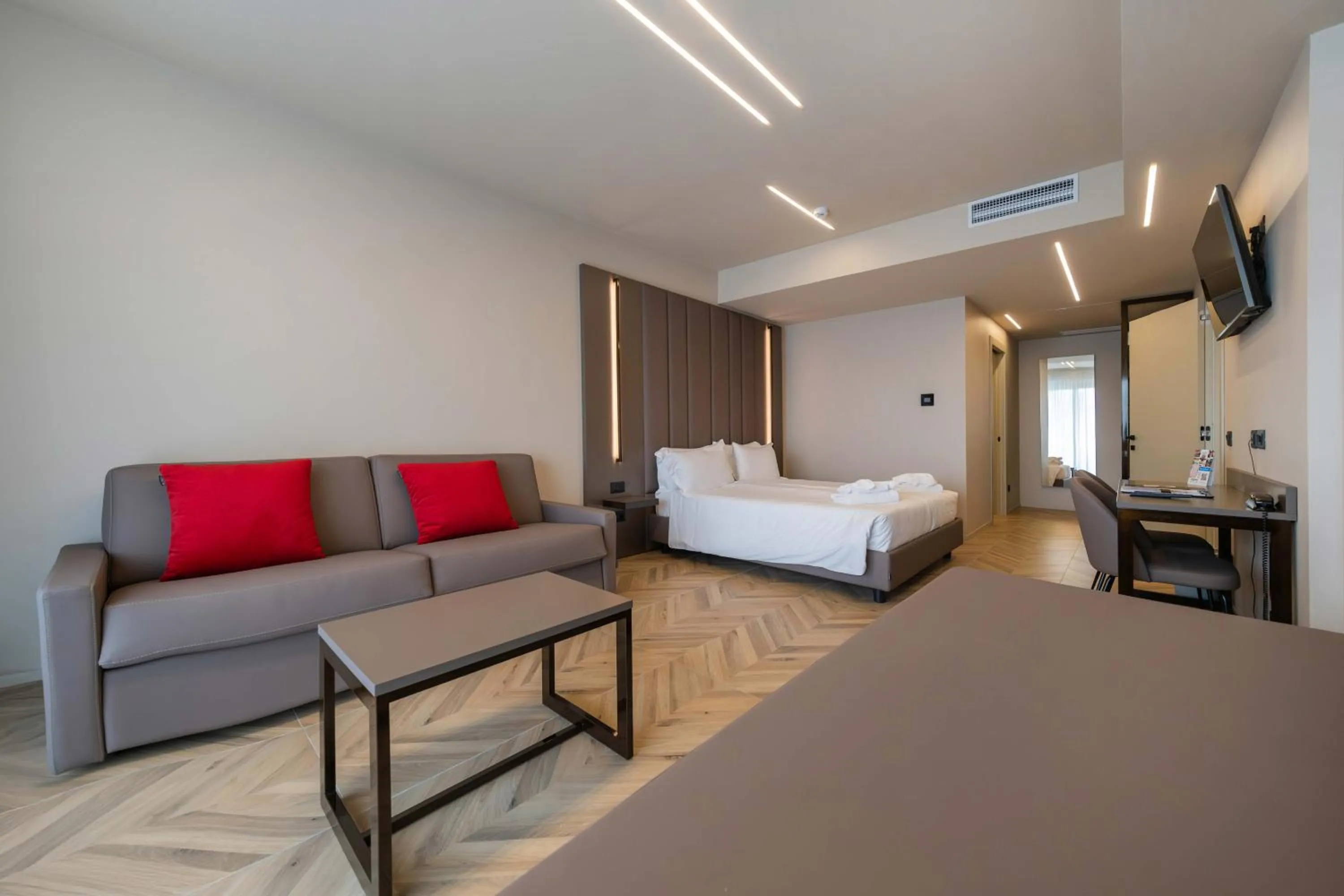 Bed in Aurora ApartHotel