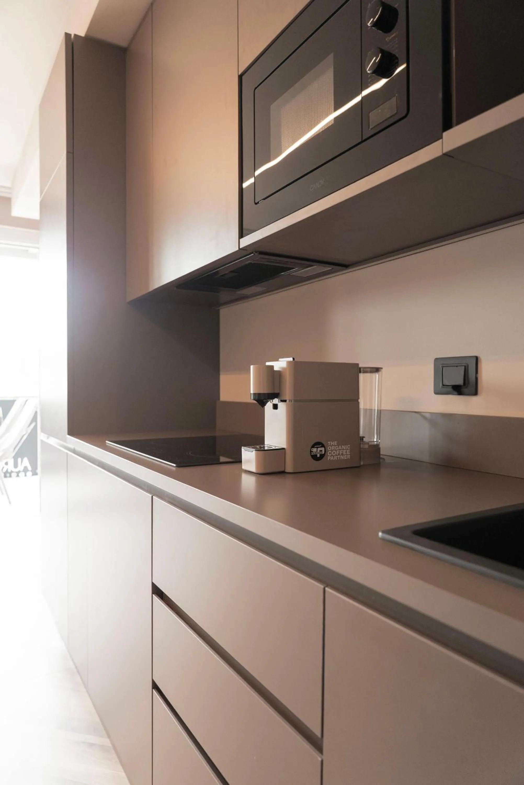 Kitchen or kitchenette in Aurora ApartHotel