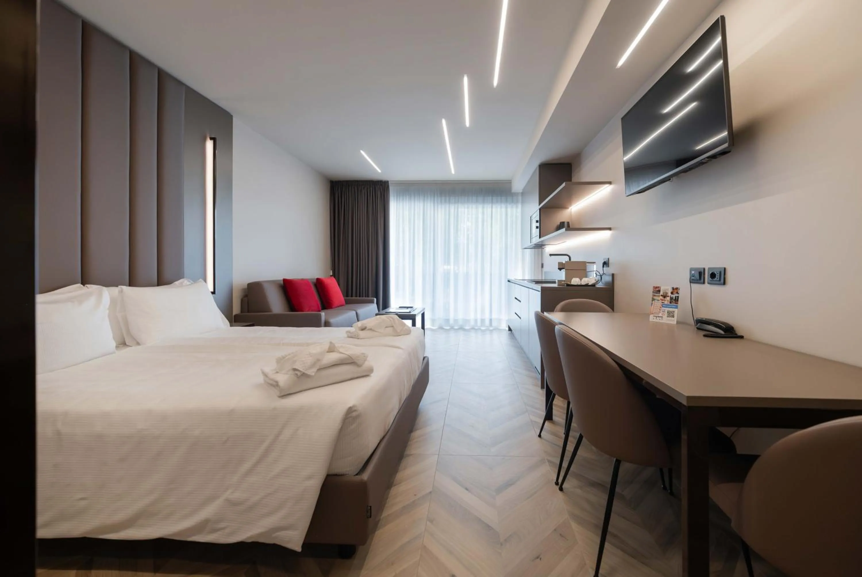 Bed in Aurora ApartHotel