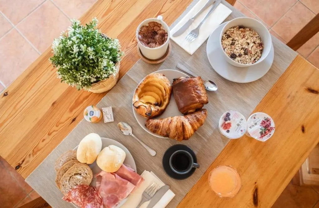 Continental breakfast in Residence Cascina Genzianella