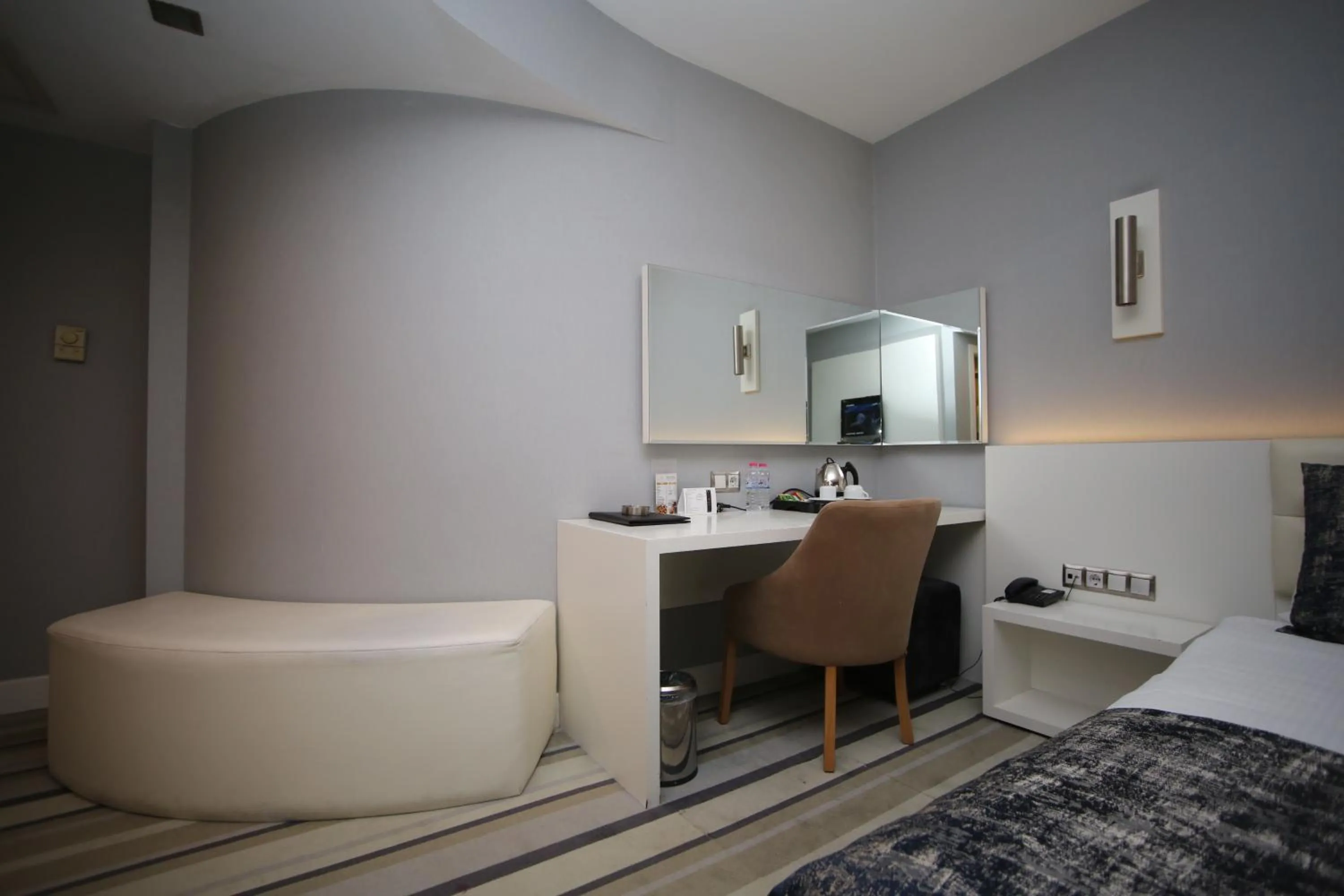 Bed in Grand Nora Hotel