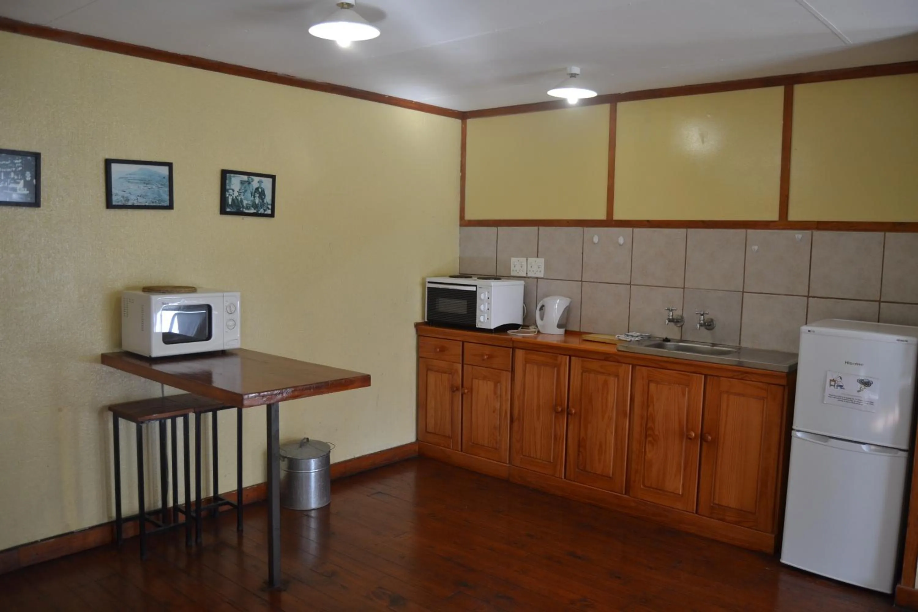 Kitchen or kitchenette in Log Cabin & Settlers Village