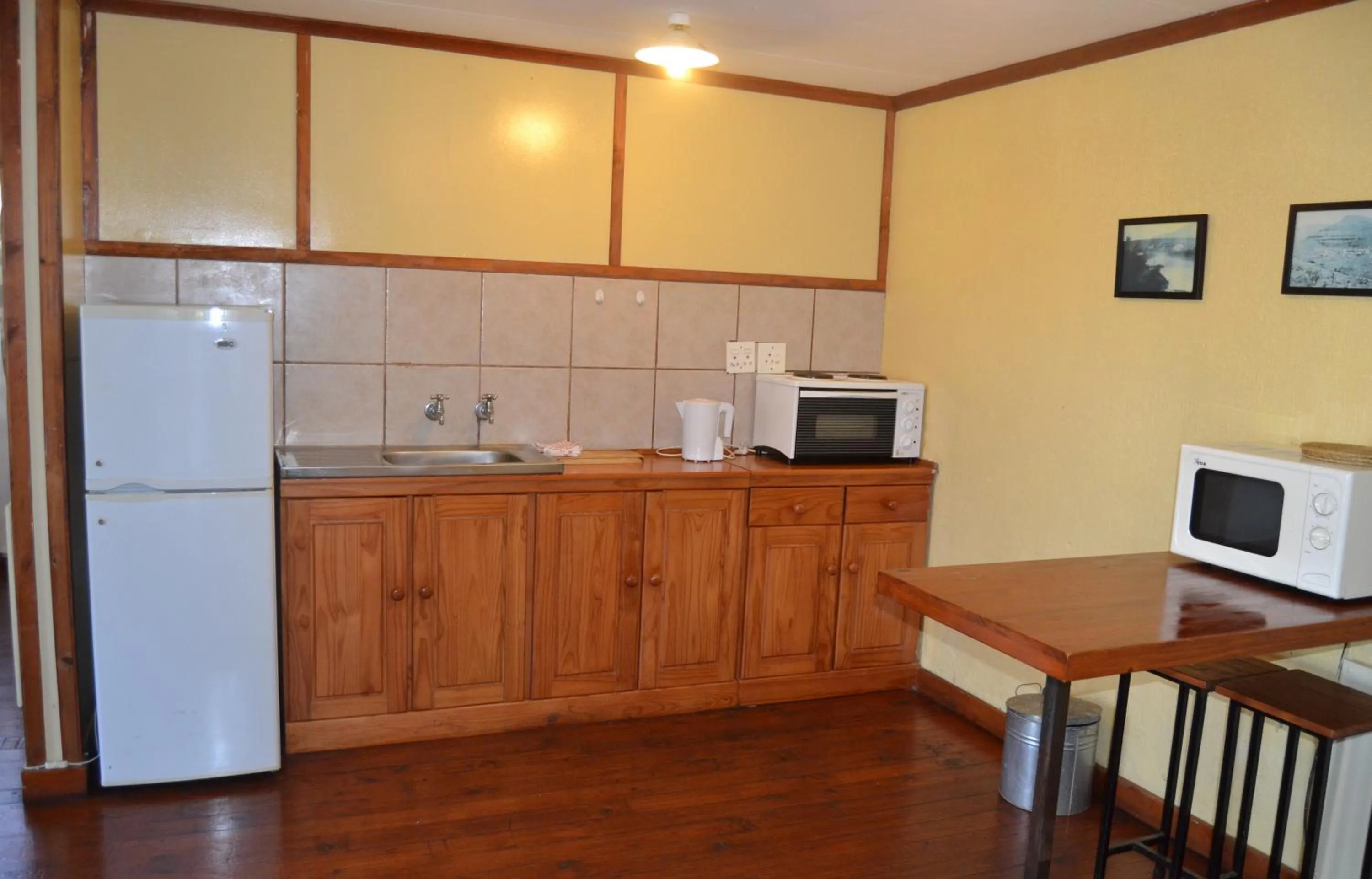 Kitchen or kitchenette in Log Cabin & Settlers Village
