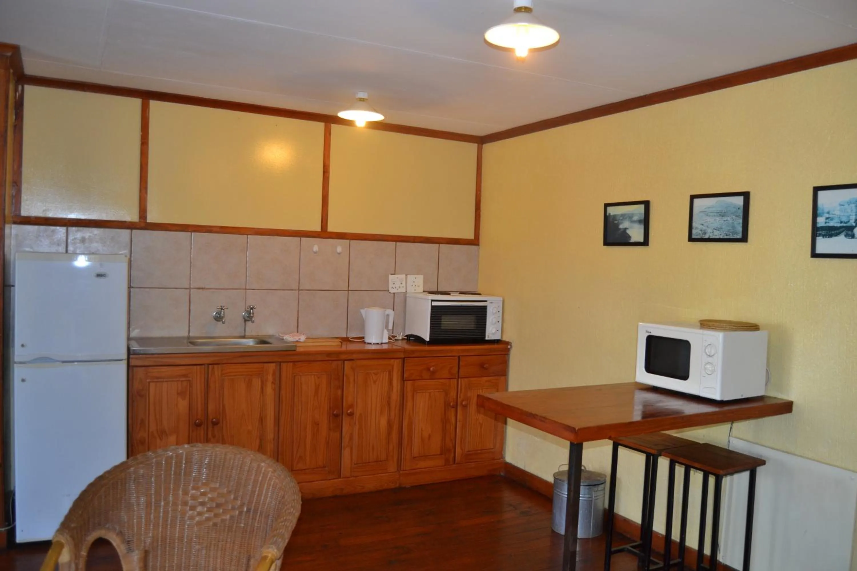 Kitchen or kitchenette in Log Cabin & Settlers Village