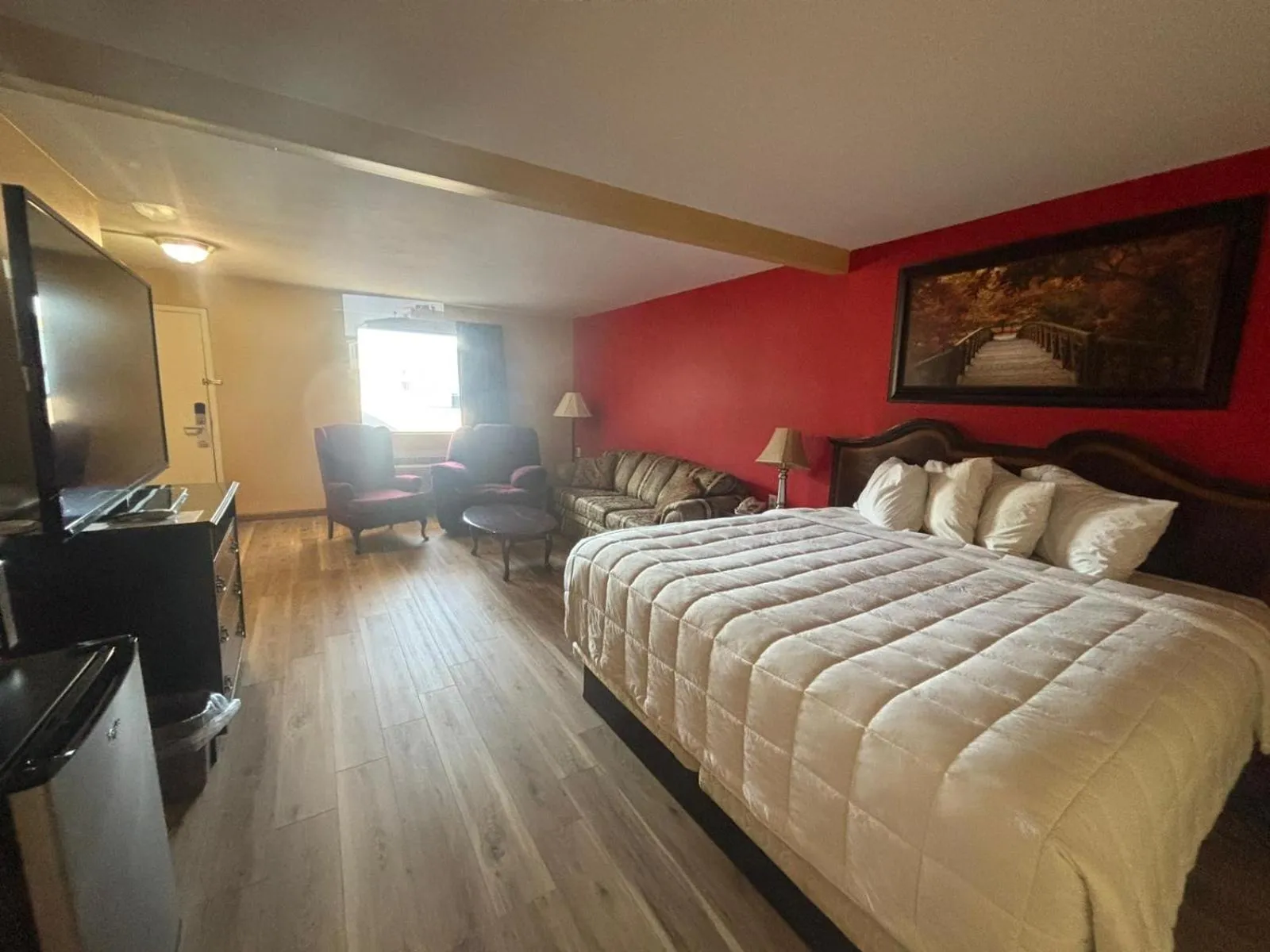 Bed in ECONOMY INN & SUITES