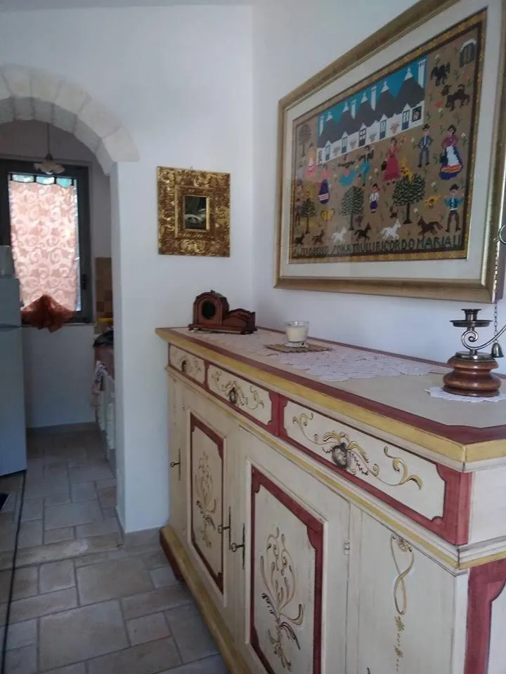 Communal lounge/ TV room in Trulli Villa Gloria