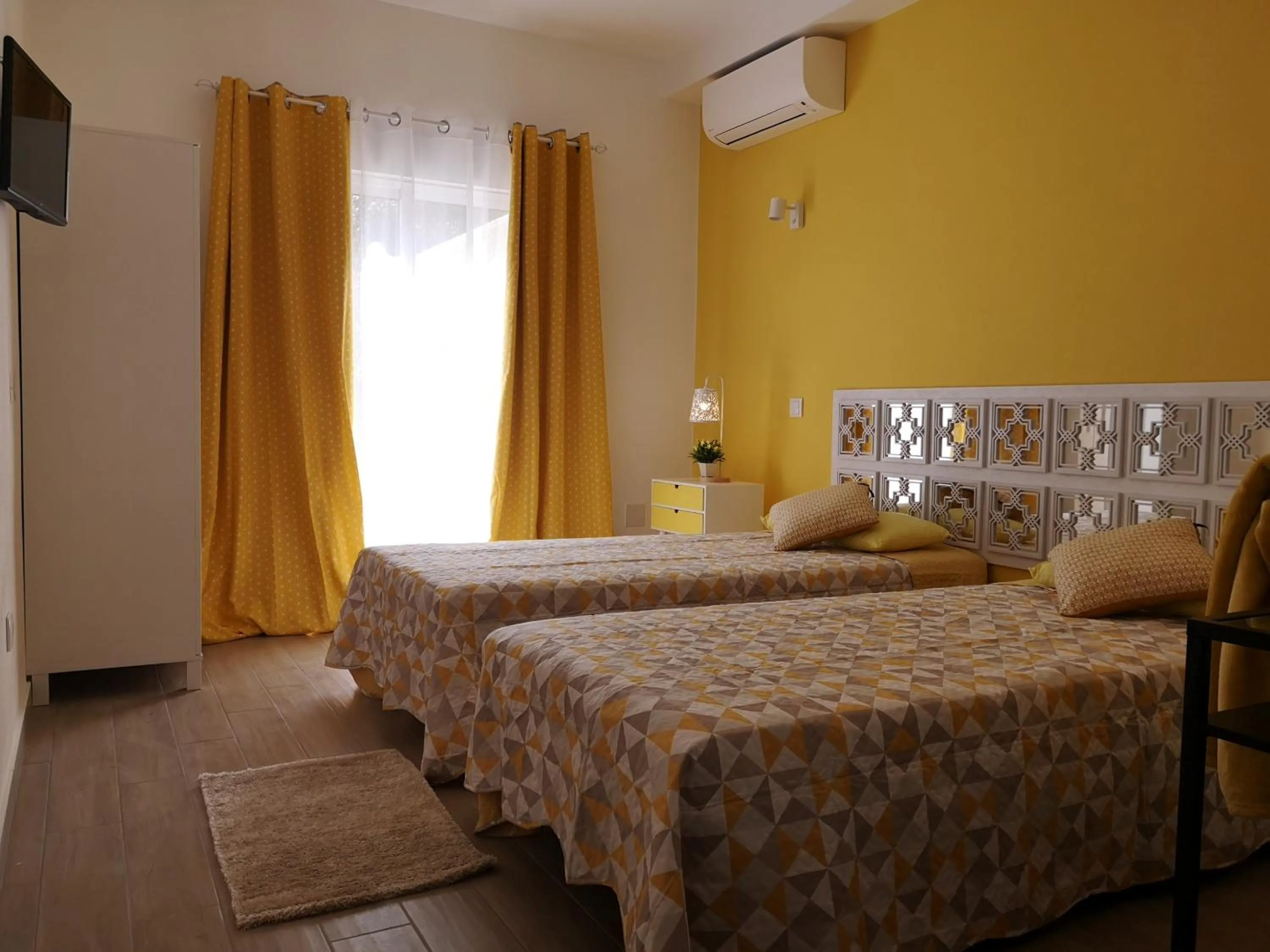 Bed in Sensations Guesthouse