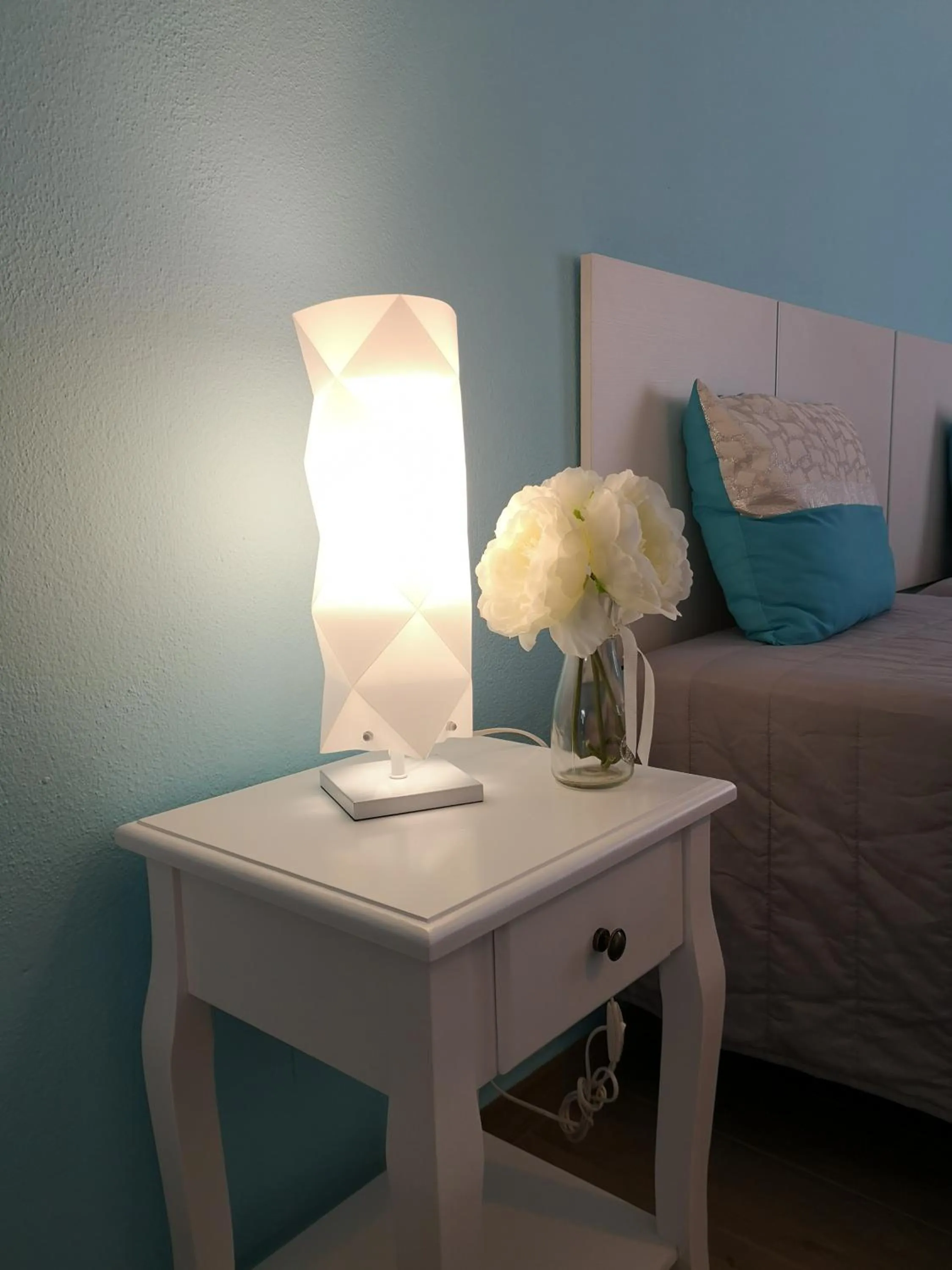 Bed in Sensations Guesthouse