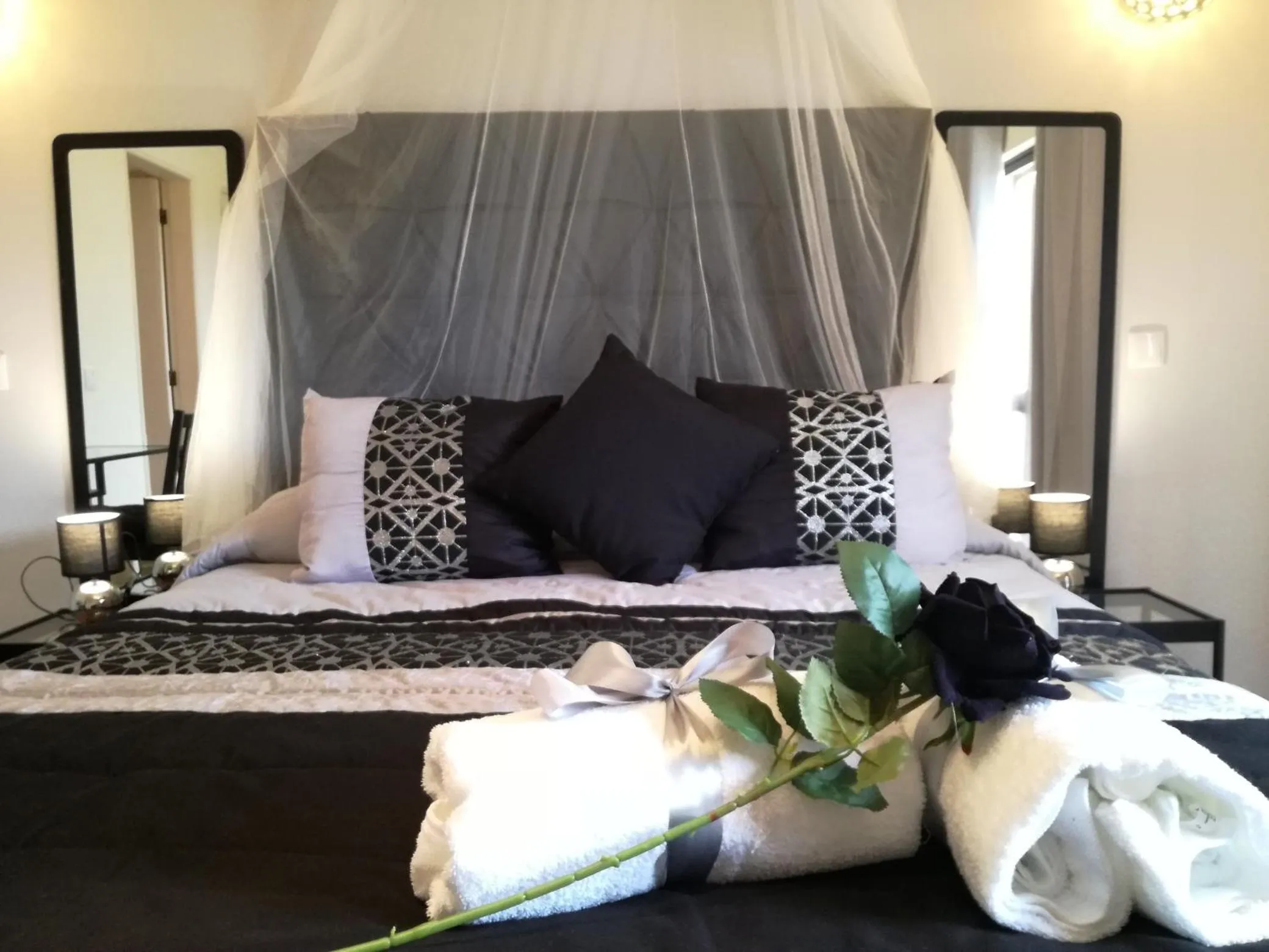 Bed in Sensations Guesthouse