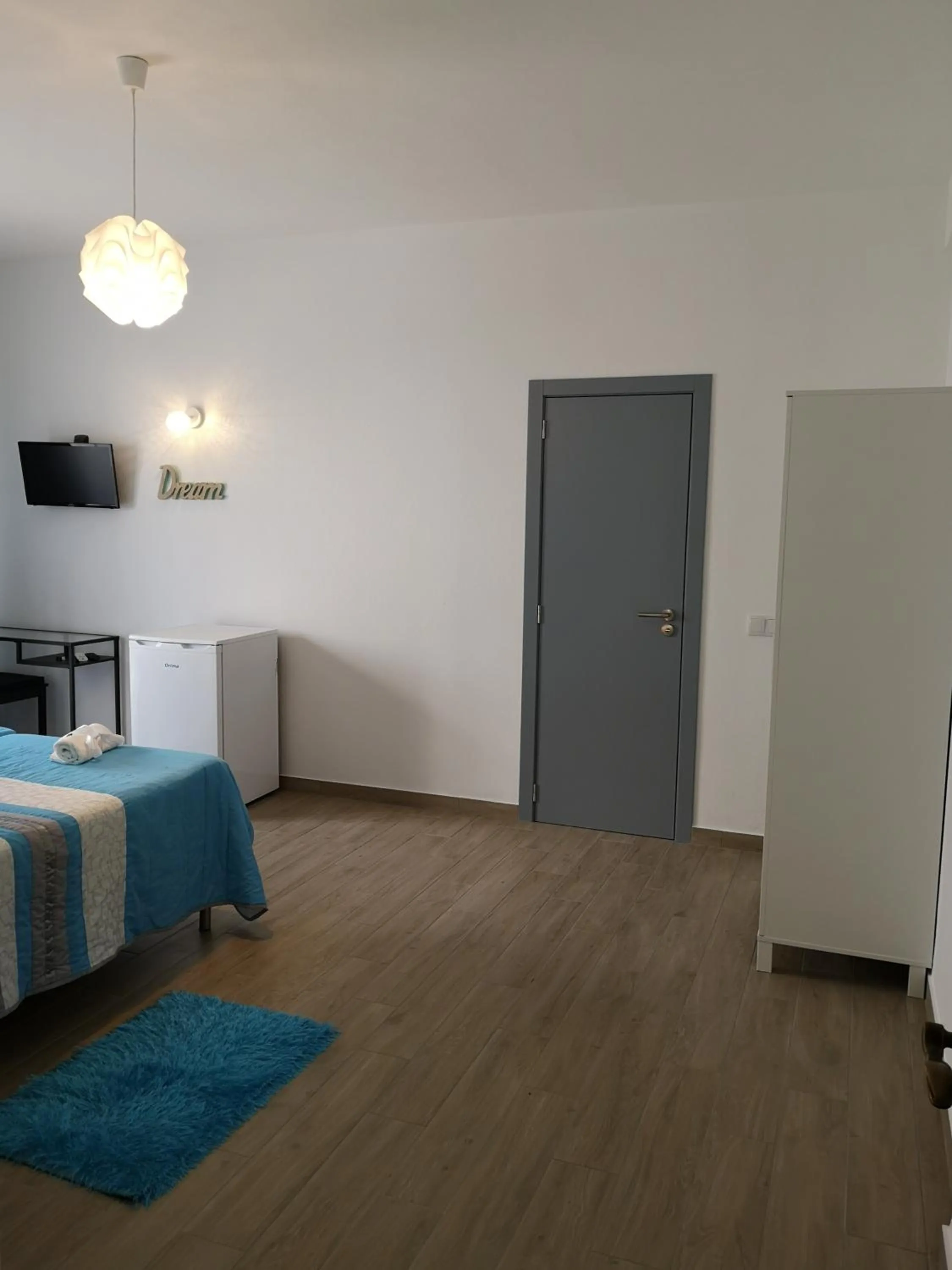 Bed in Sensations Guesthouse