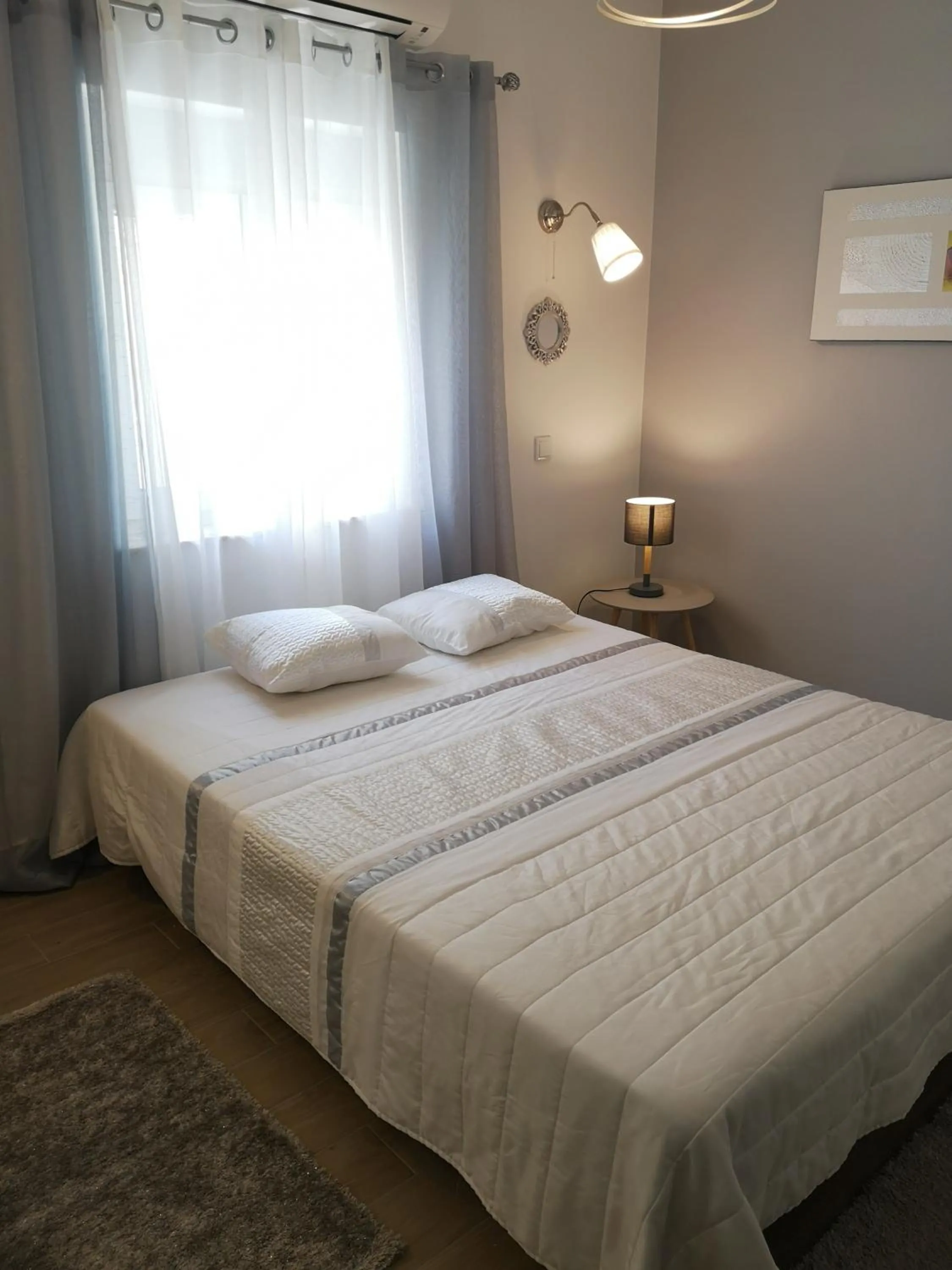 Bed in Sensations Guesthouse