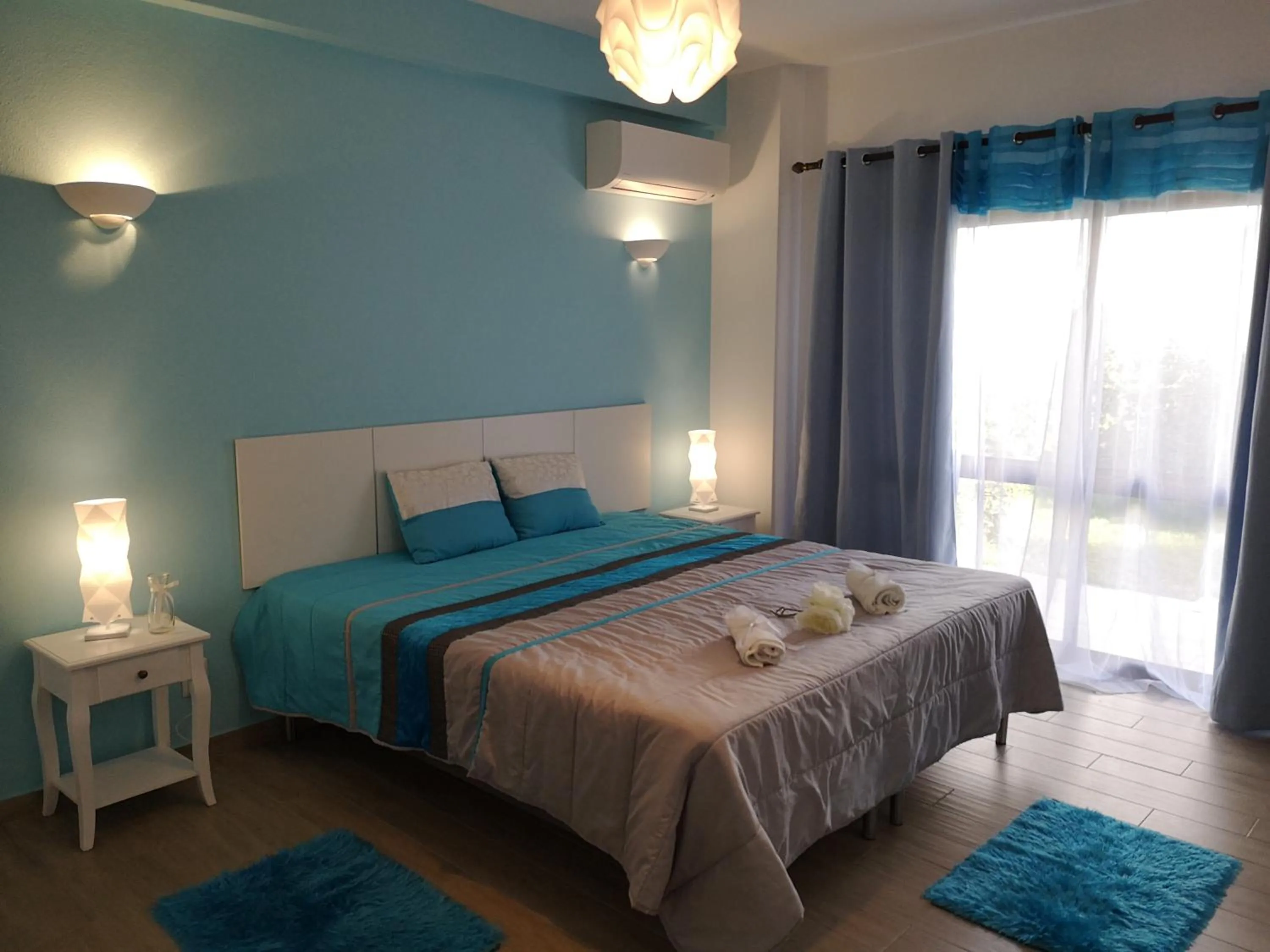 Bed in Sensations Guesthouse