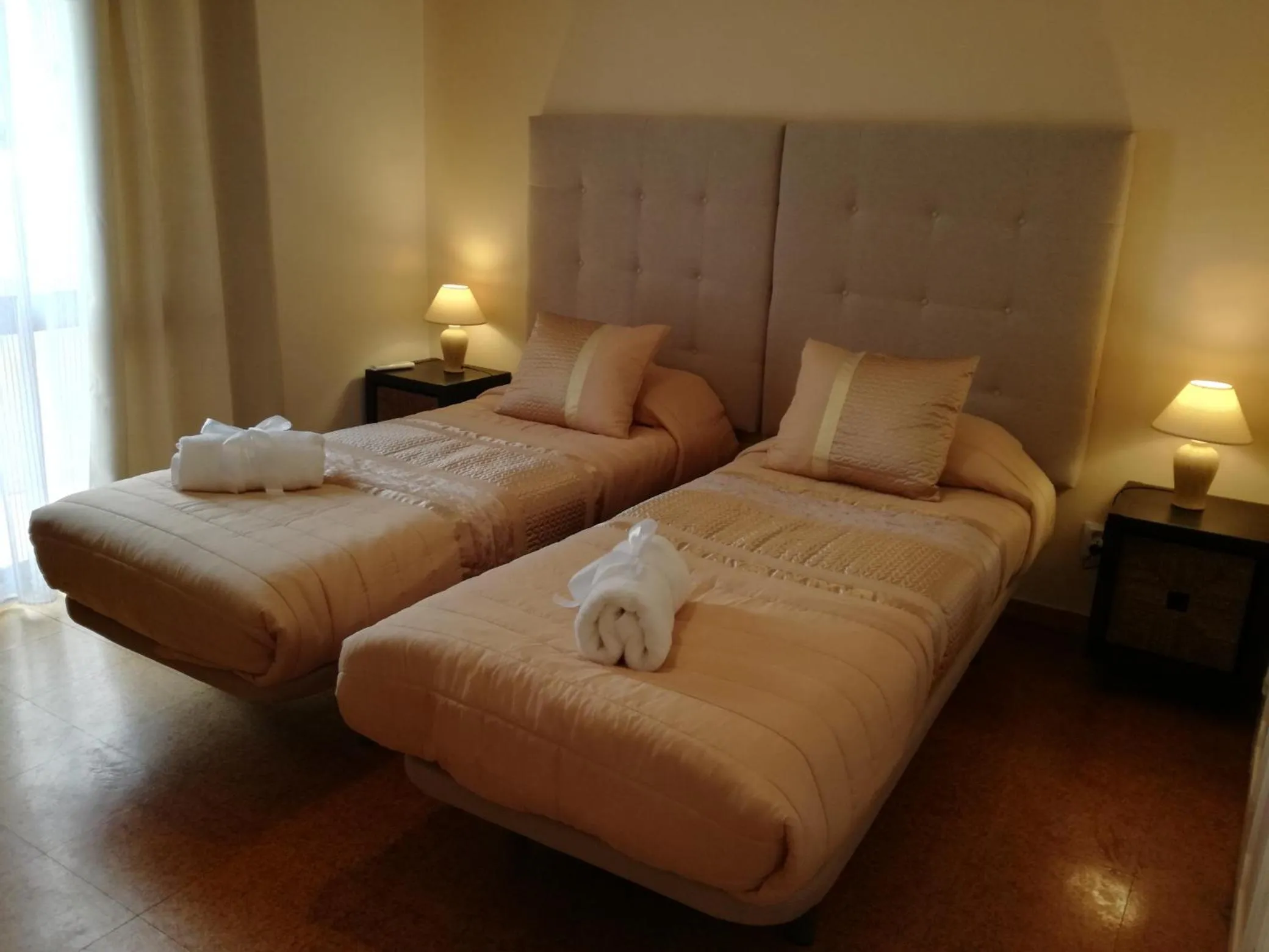 Bed in Sensations Guesthouse