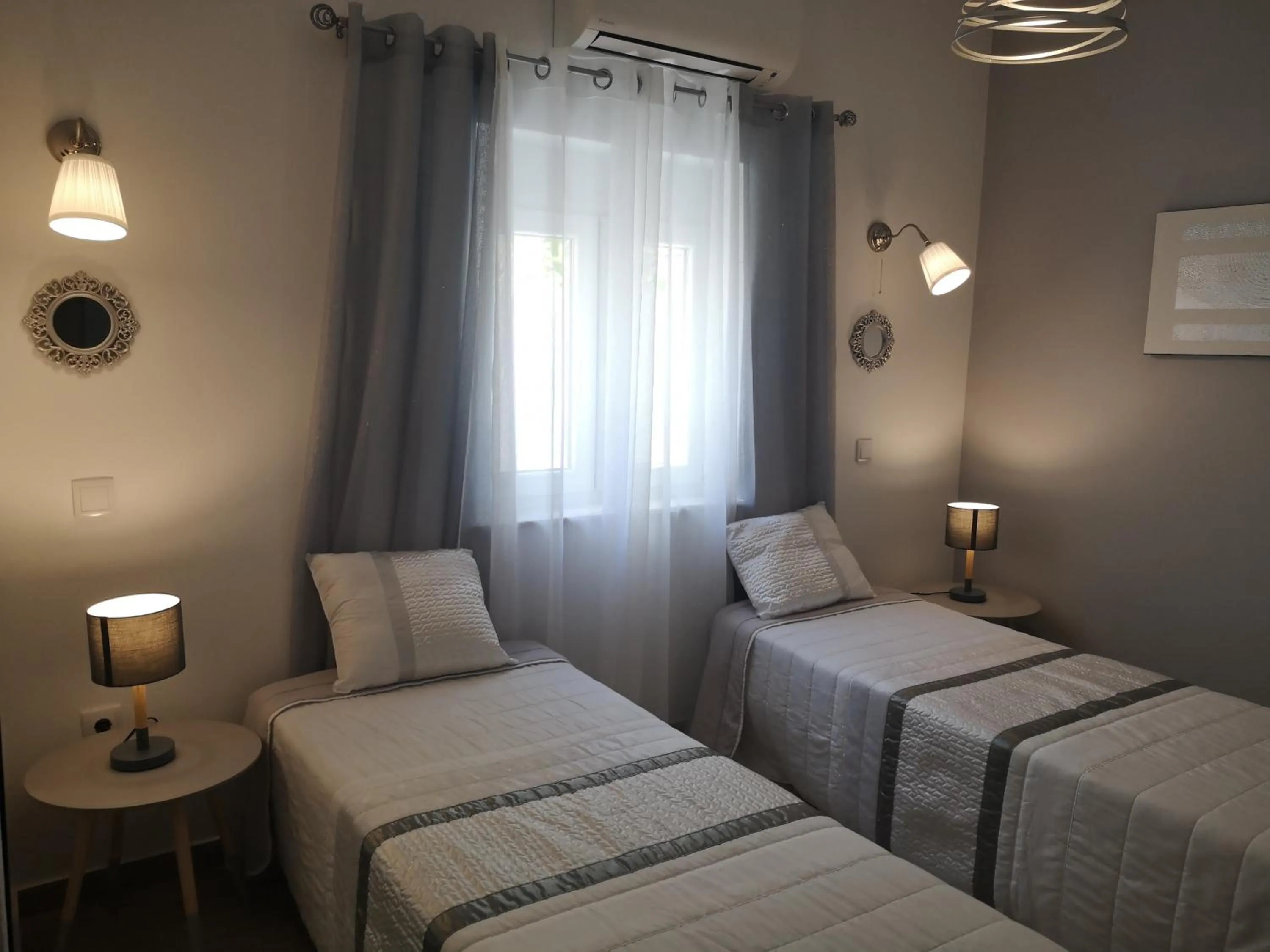 Bed in Sensations Guesthouse