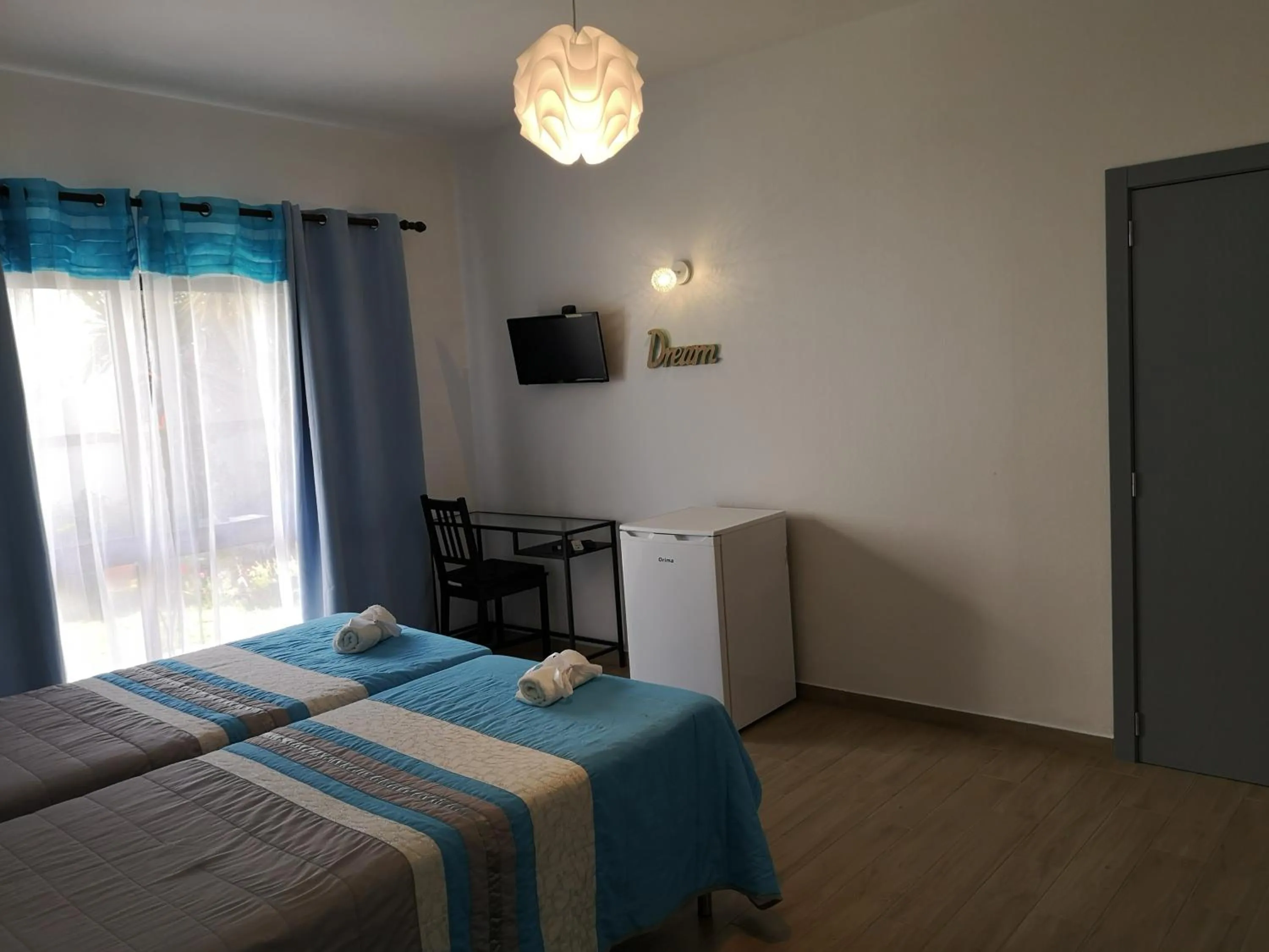 Bed in Sensations Guesthouse