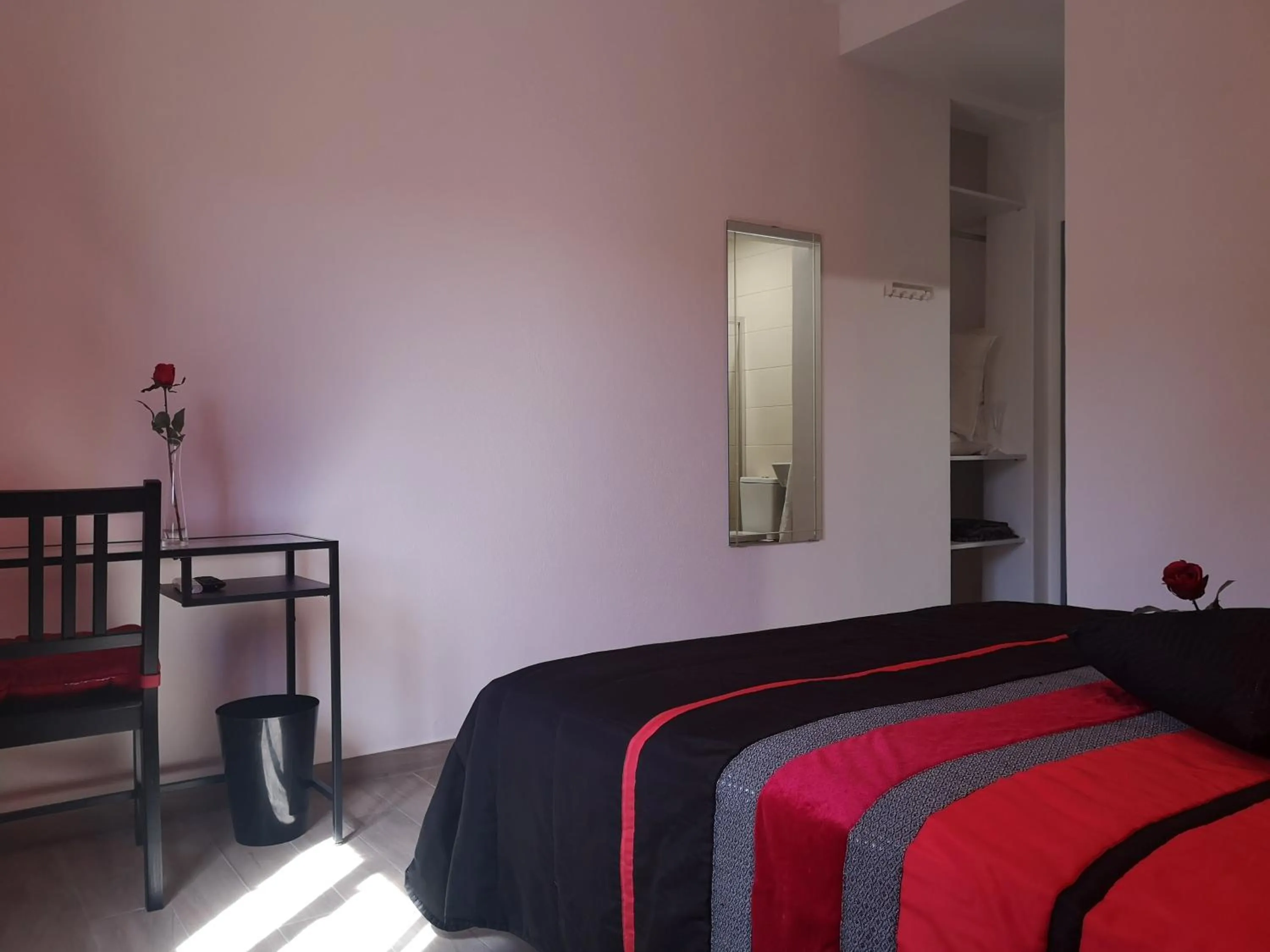 Bed in Sensations Guesthouse