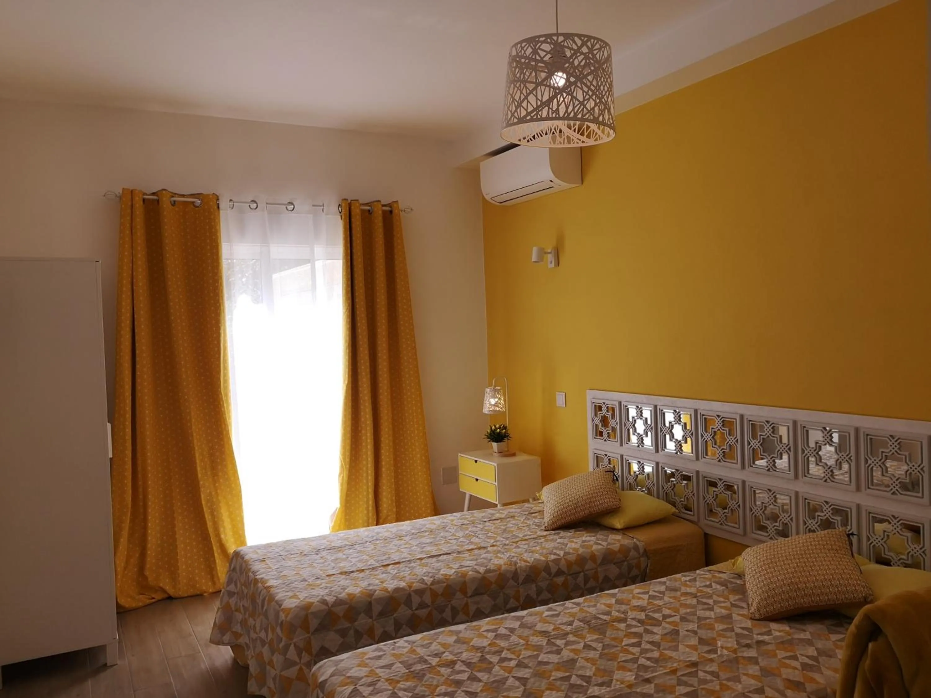 Bed in Sensations Guesthouse