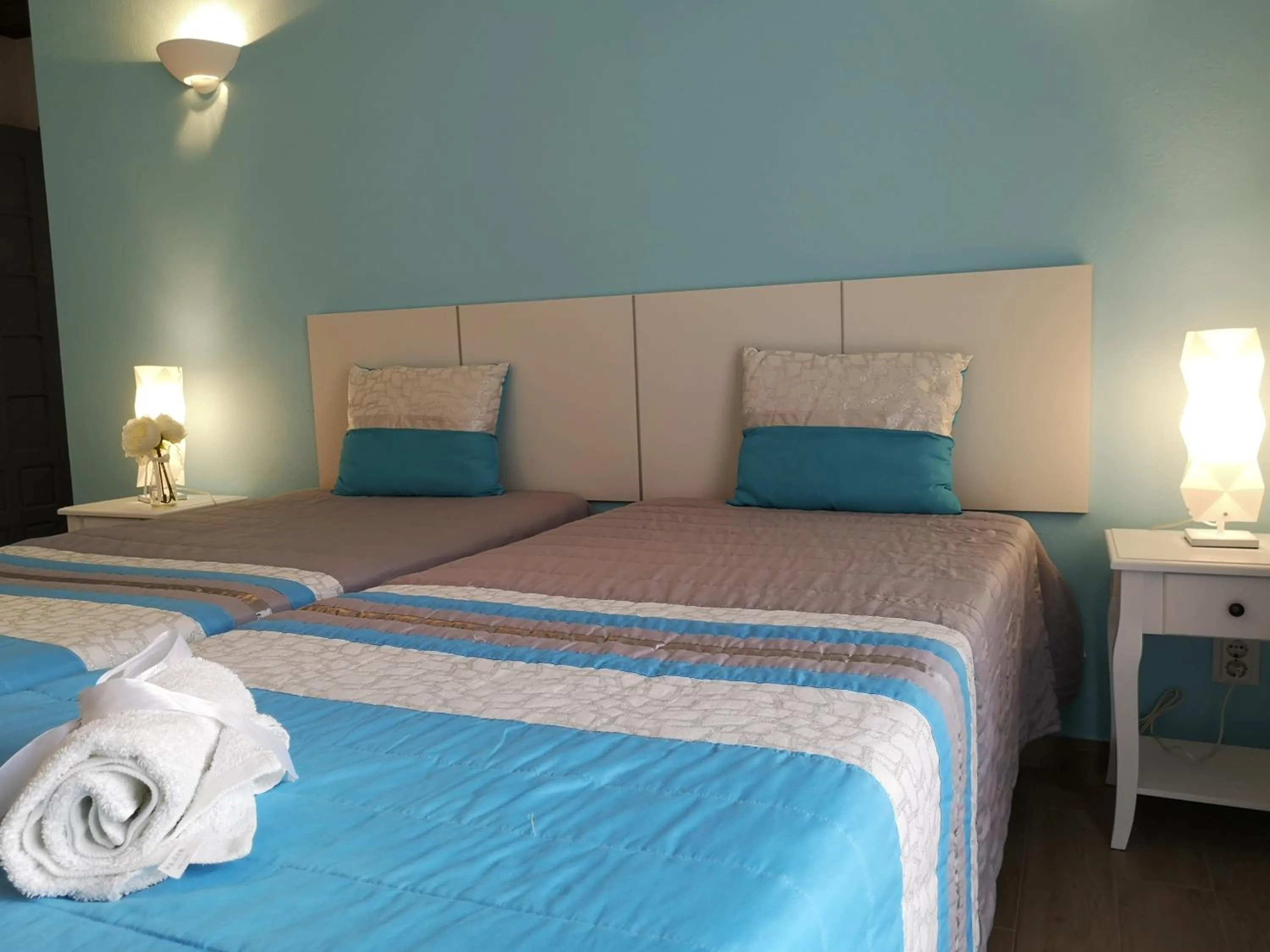 Bed in Sensations Guesthouse