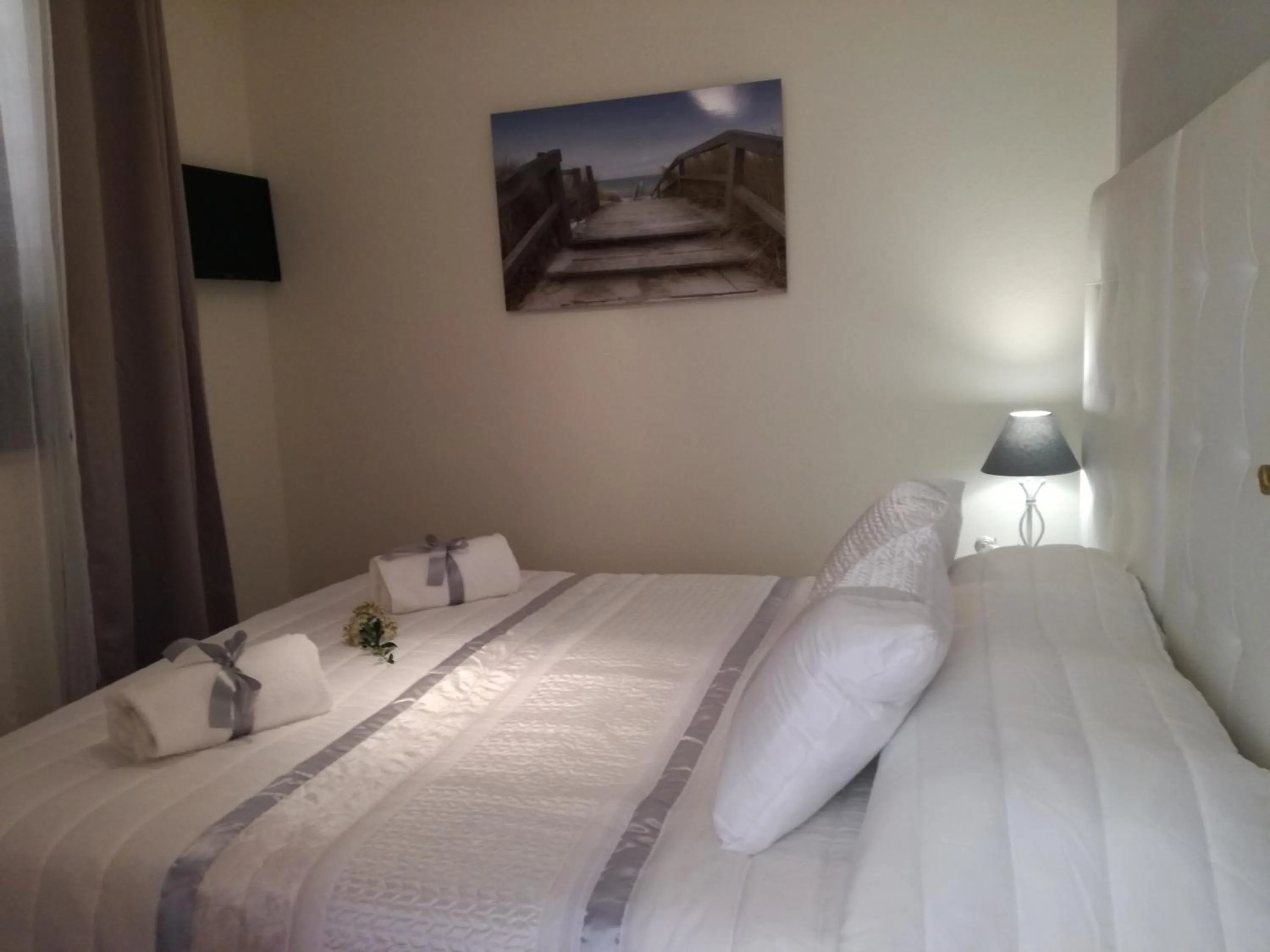 Bed in Sensations Guesthouse