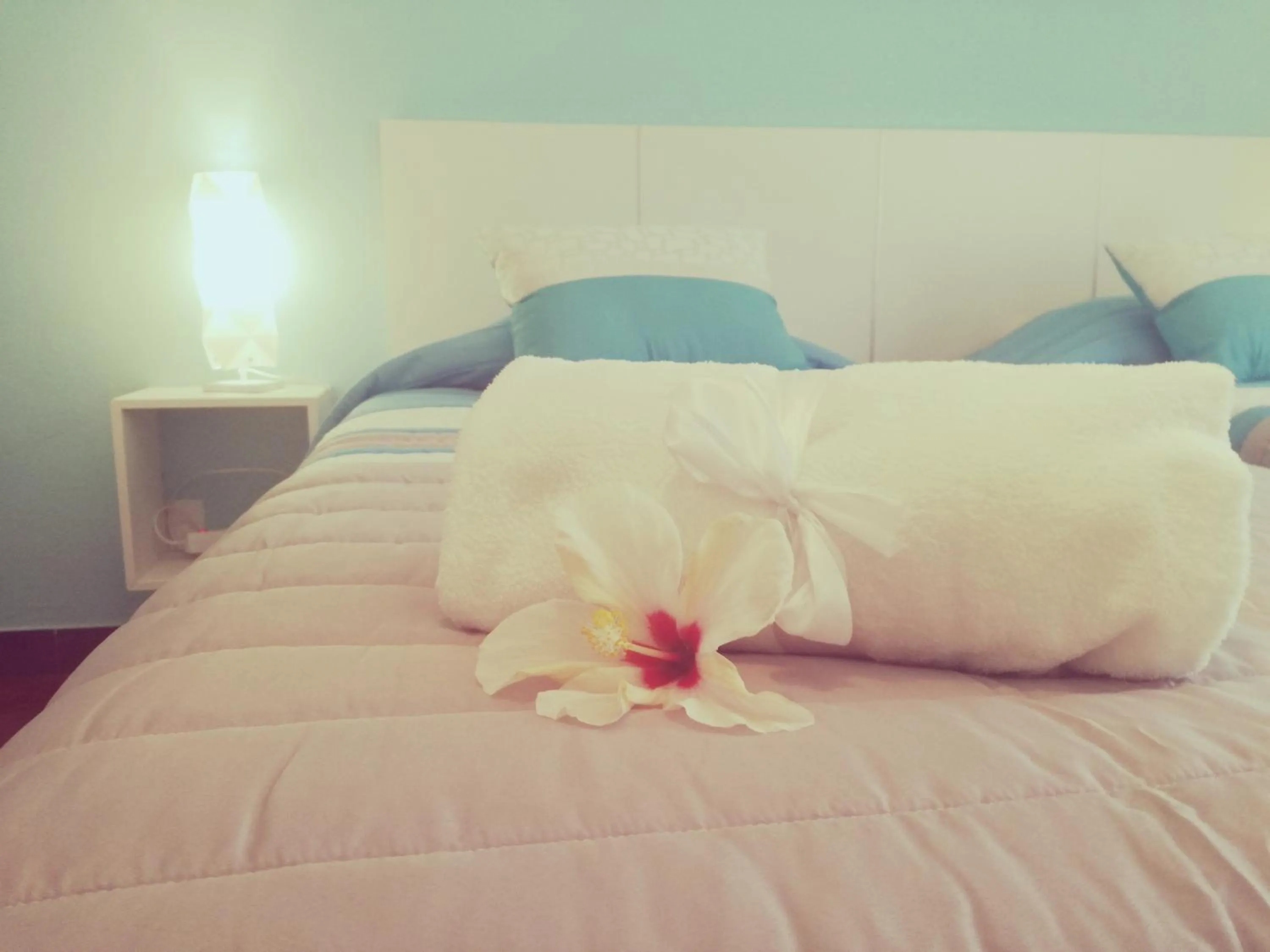 Bed in Sensations Guesthouse