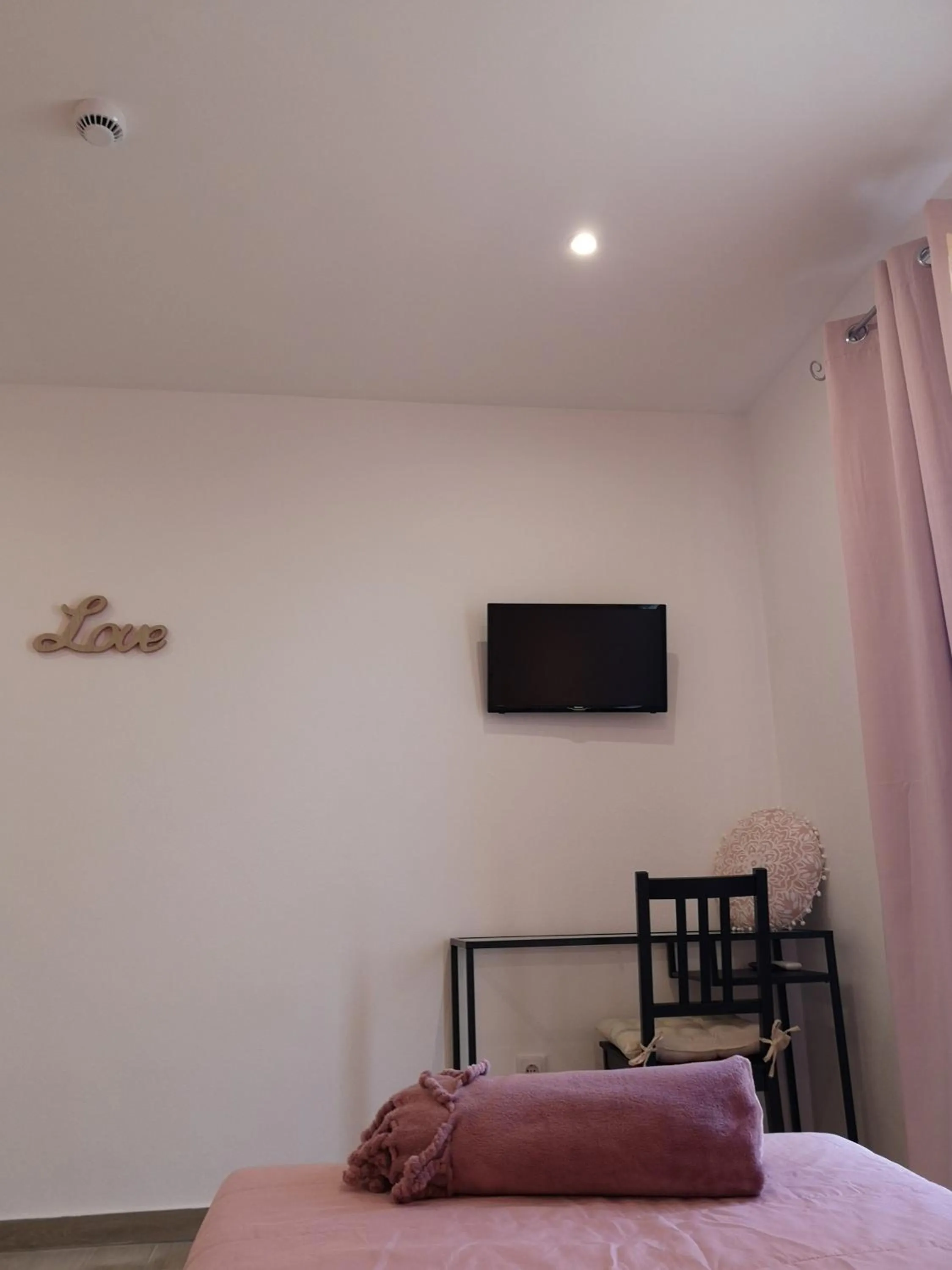 Bed in Sensations Guesthouse