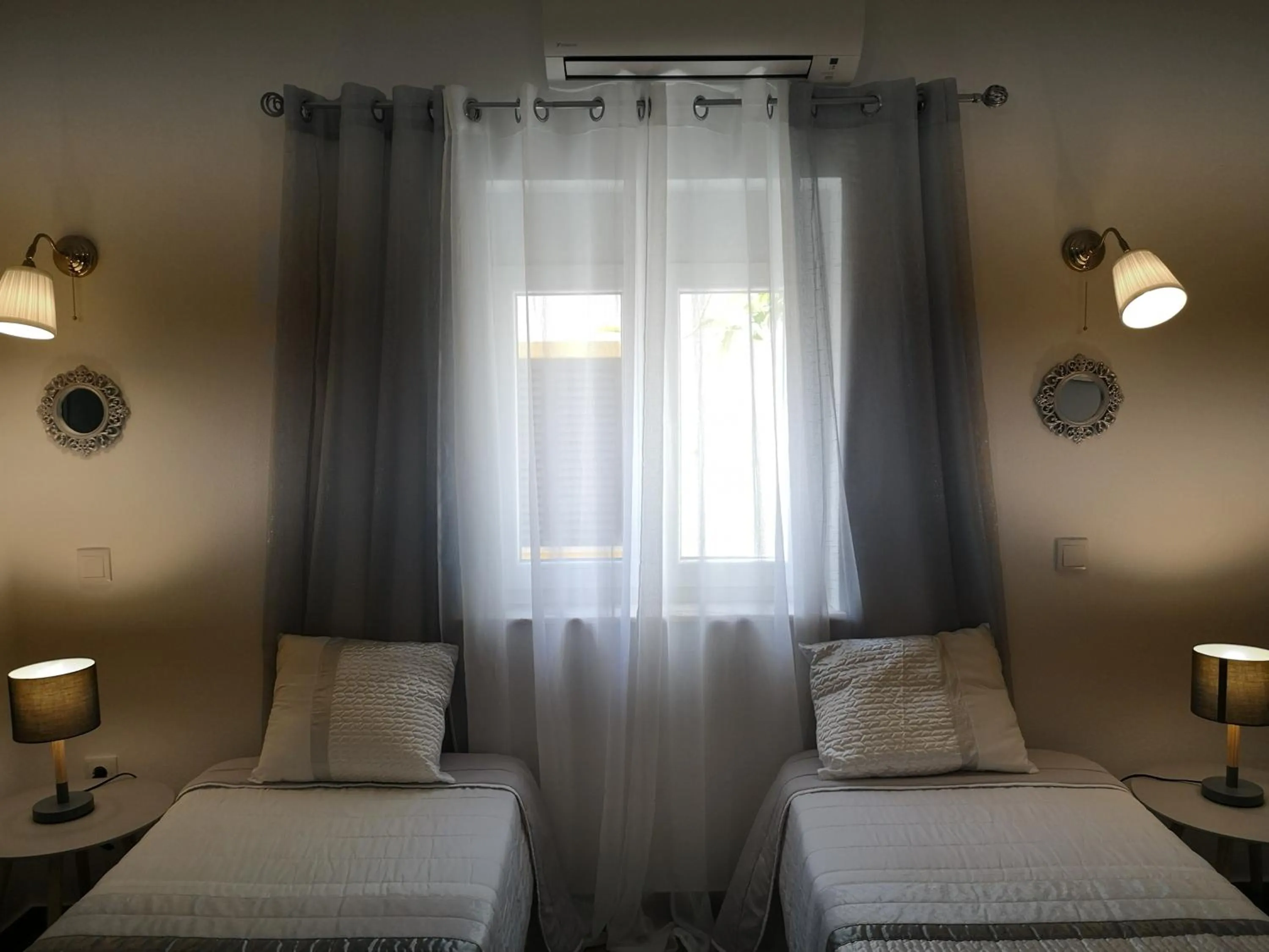 Bed in Sensations Guesthouse