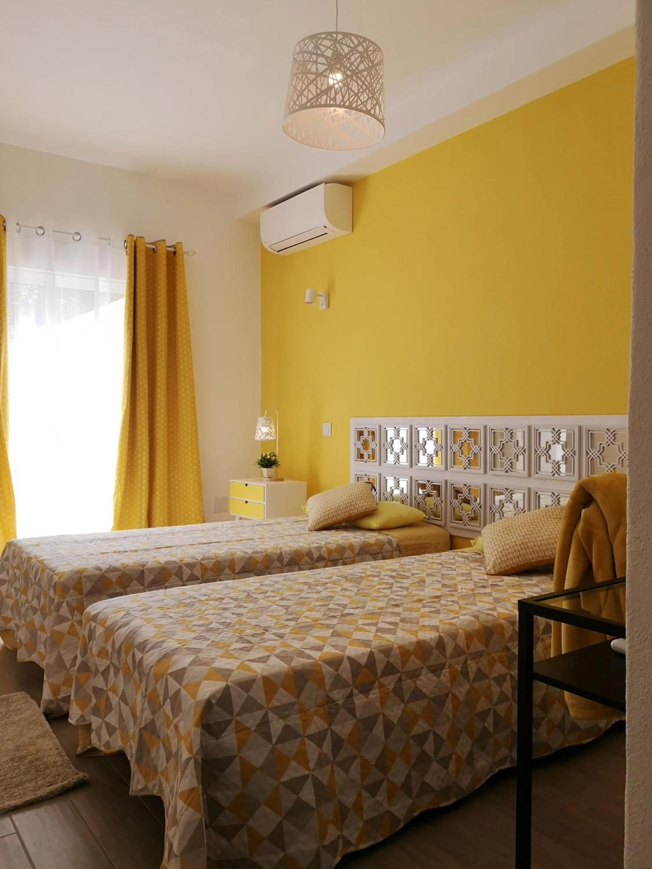 Bed in Sensations Guesthouse