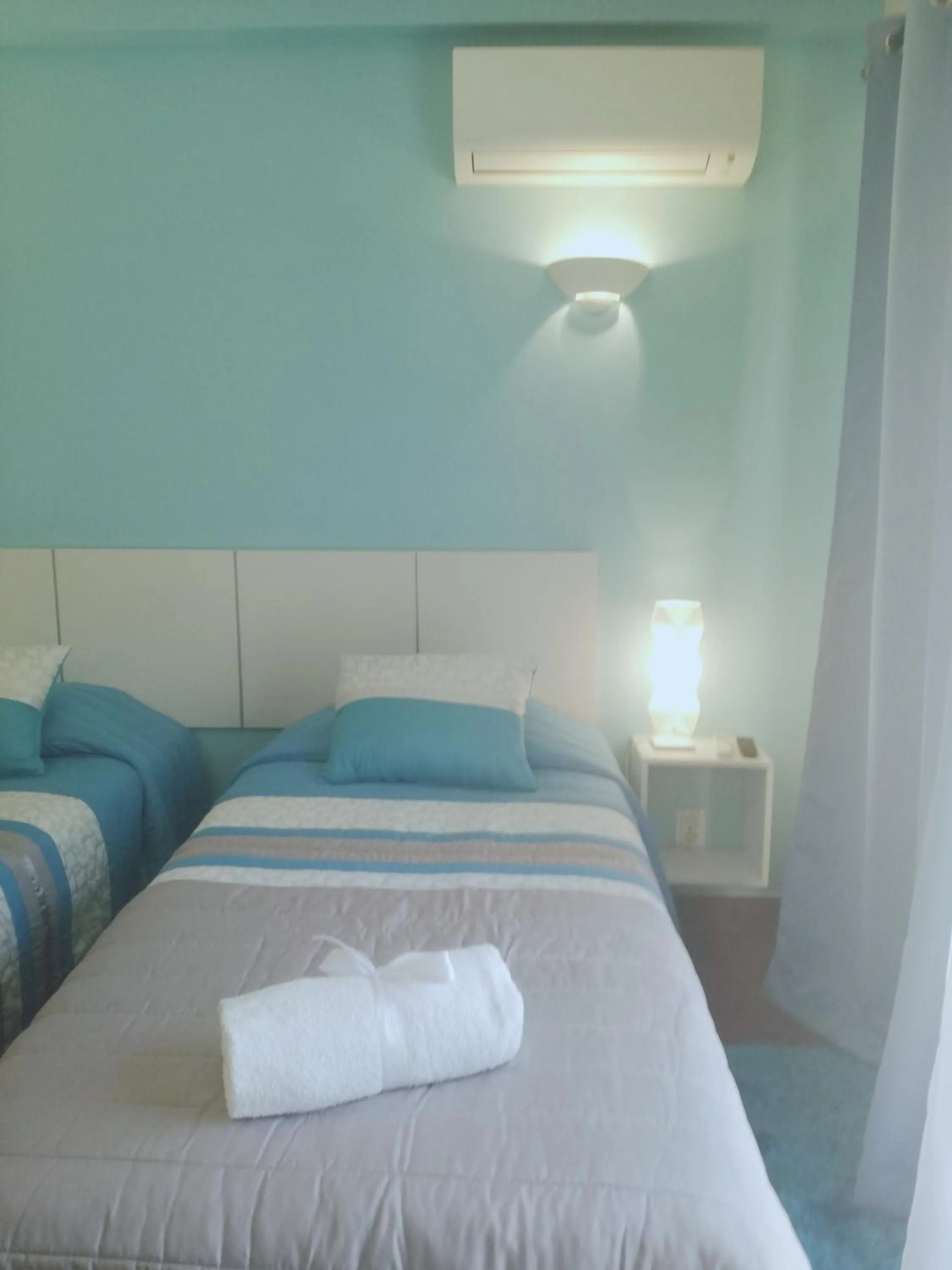 Bed in Sensations Guesthouse