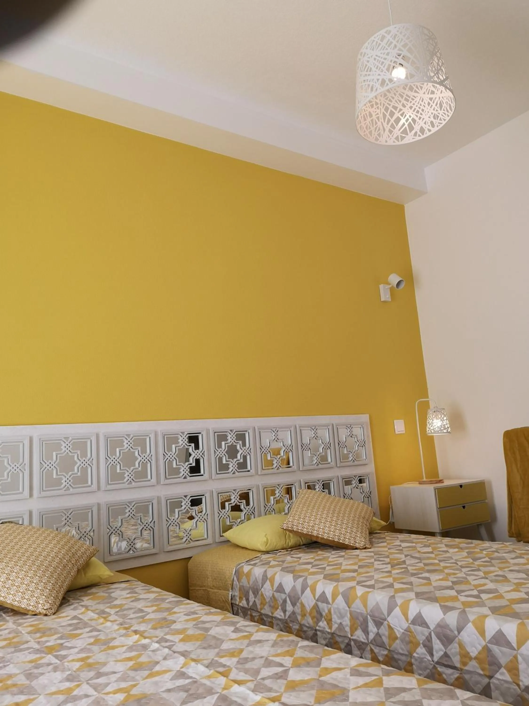 Bed in Sensations Guesthouse