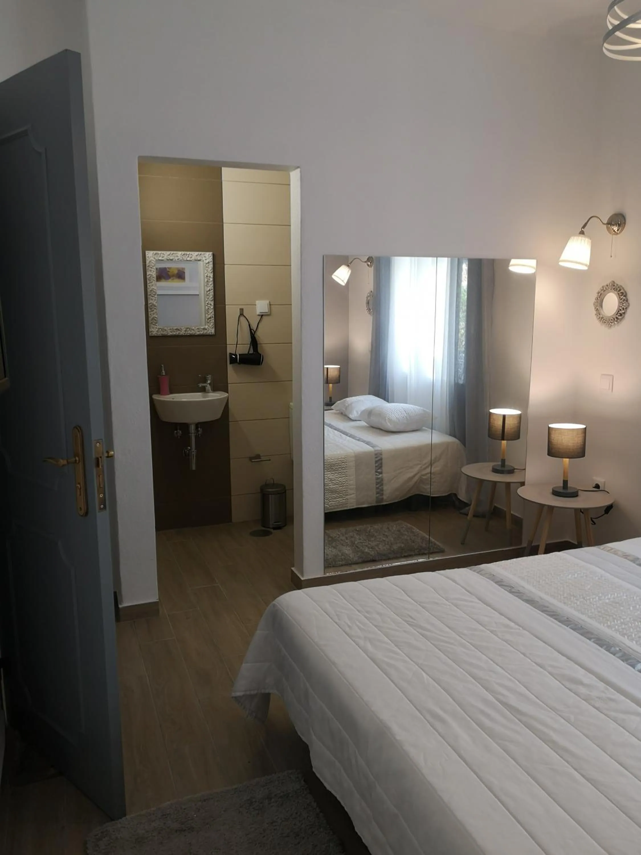 Bed in Sensations Guesthouse