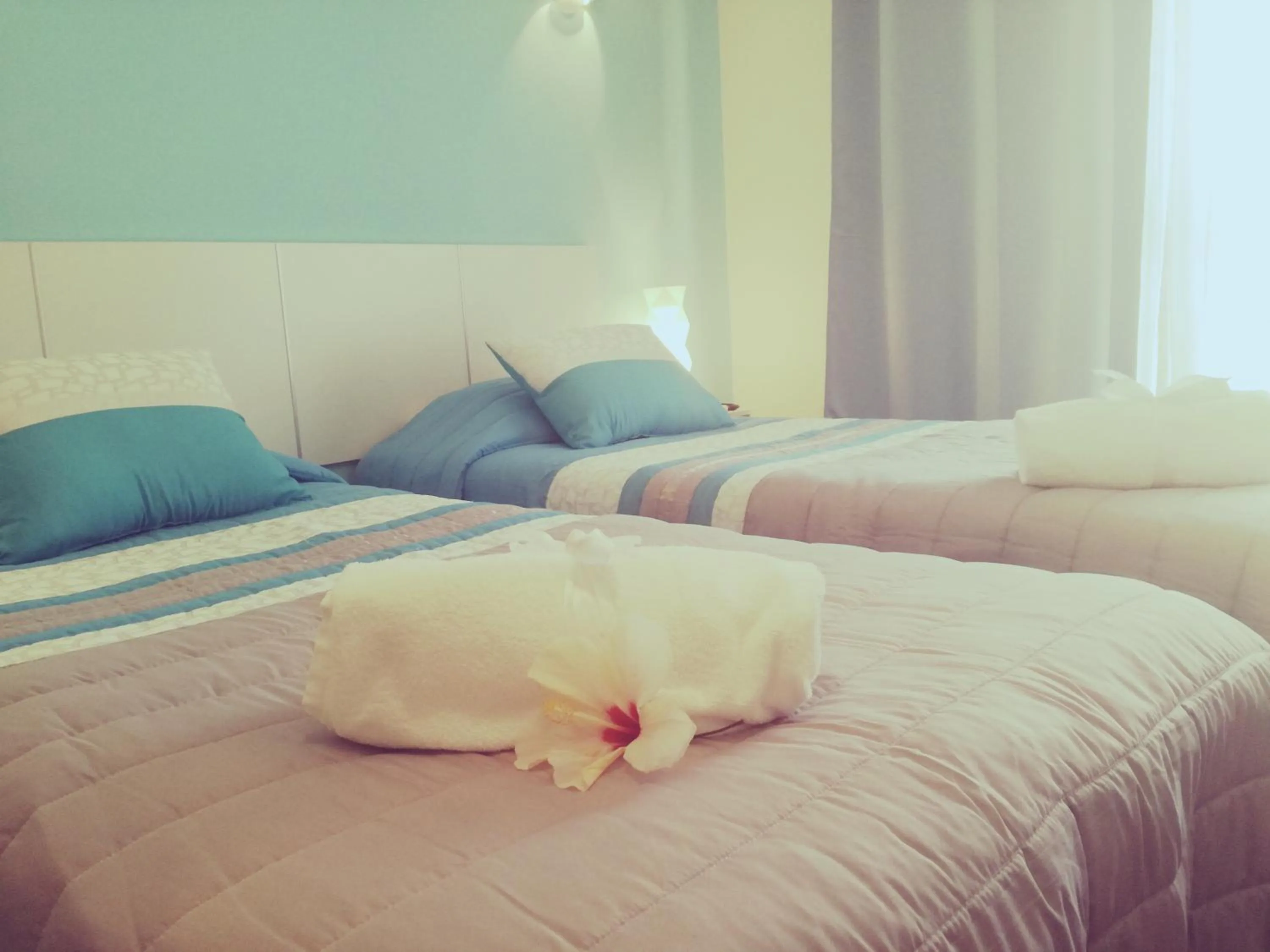 Bed in Sensations Guesthouse