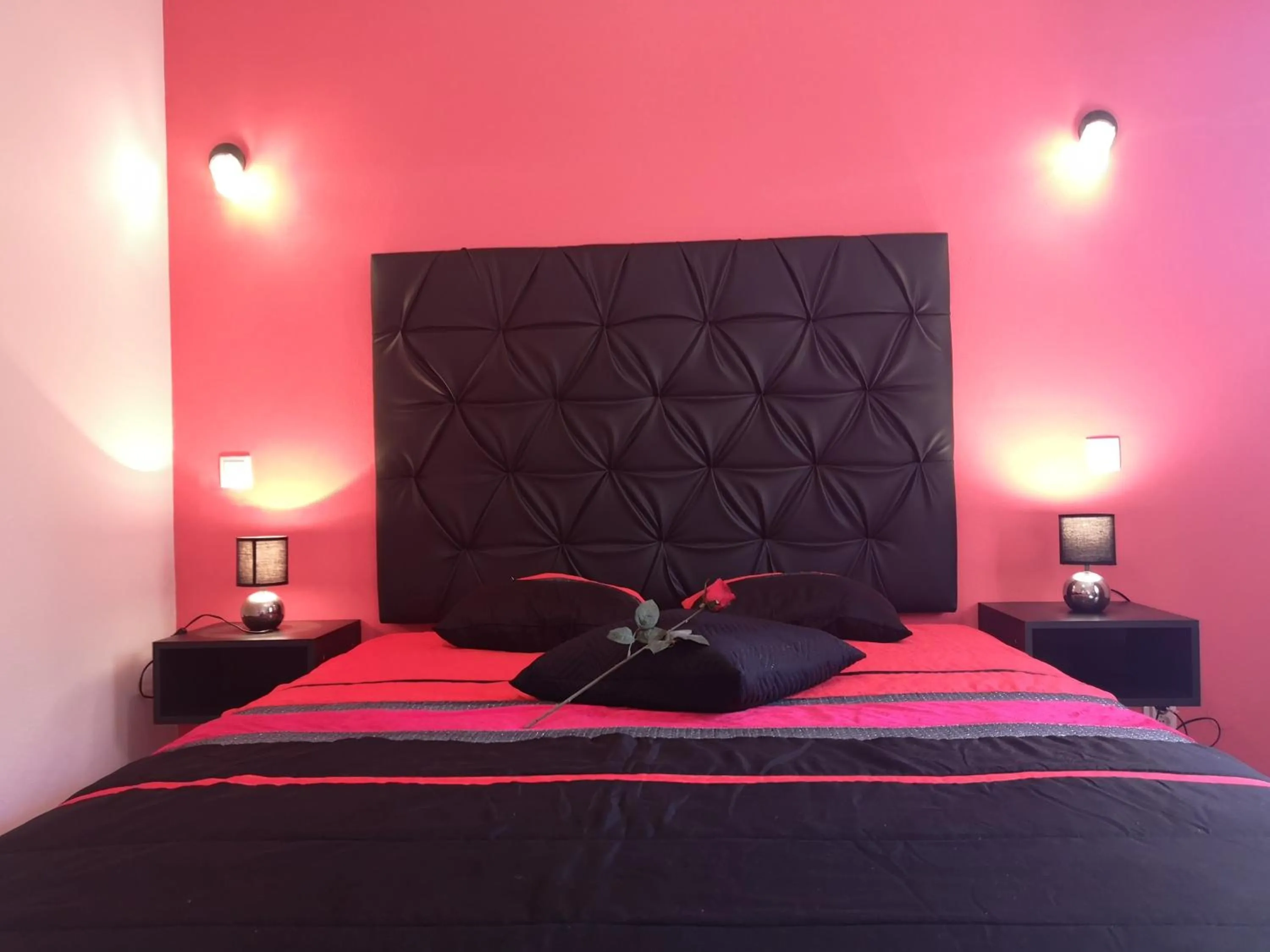 Bed in Sensations Guesthouse